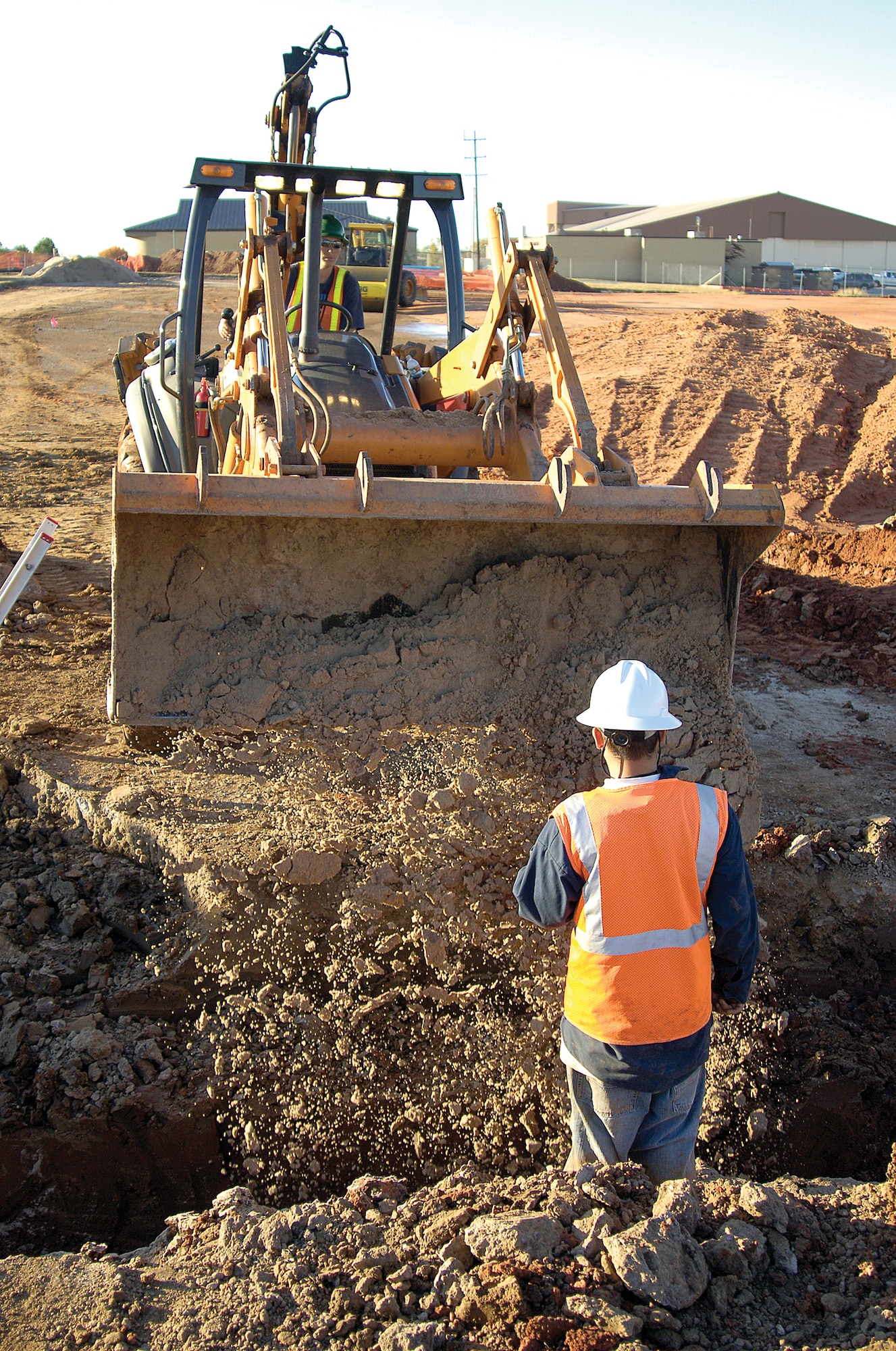 Once a parking lot and area for motorcycle safety classes, earth work has begun for a new building in the 507th Air Refueling Wing area on base. The building will house Air Force Reserve and Air National Guard members and was an outcome of the 2005 Base Realignment and Closure process. The $8 million facility is expected to be completed late in 2009. (Air Force photo/Margo Wright)