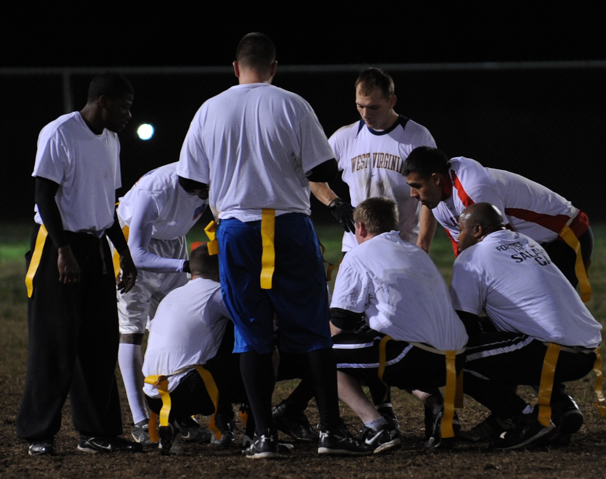 LANGLEY AIR FORCE BASE, Va. – The 1st Equipment Maintenance Squadron Bulldogs huddle during a timeout as they try to mount a comeback late in the game during the 2008 Intramural Flag Football Championship Nov. 10.  The Bulldogs lost 14 to 6 to the 1st Security Forces Squadron Defenders.  (U.S. Air Force photo/Airman 1st Class Zachary Wolf)