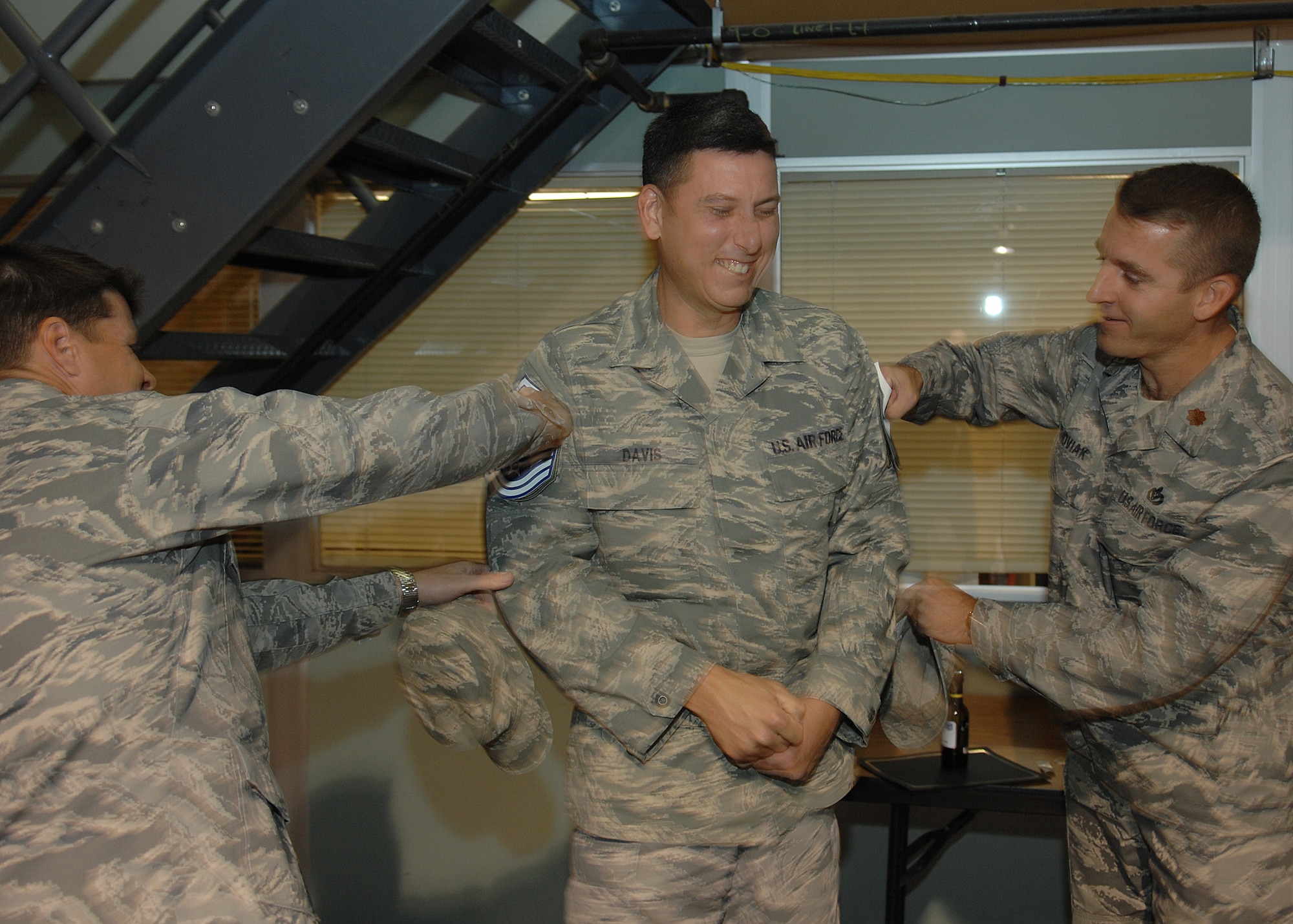 Several Chief Master Sergeants and squadron commanders from around the wing came to show their support for Senior Master Sgt. Billy Davis, 49th Logistics Readiness Squadron, for his promotion to Chief Master Sergeant, Nov. 11, at Holloman Air Force Base, N.M. The Air Force recently announced the names of 520 Senior Master Sergeants who were selected for promotion to Chief Master Sergeant. (U.S. Air Force photo/Senior Airman Anthony Nelson)