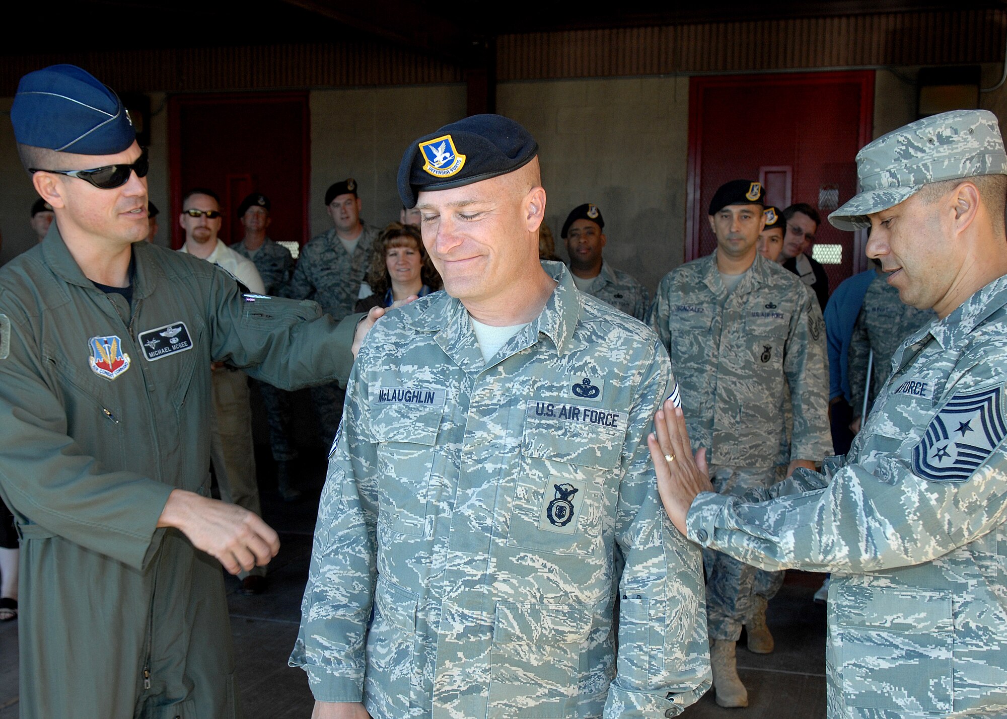 Senior Master Sgt. Timothy McLaughlin, 49th Security Forces Squadron, receives notification of his promotion to Chief Master Sergeant by Col. Michael McGee, 49th Fighter Wing vice commander and the 49 FW Command Chief, Chief Master Sgt. Jeffery Cui, Nov. 11 at Holloman Air Force Base, N.M. The Air Force recently announced the names of 520 Senior Master Sergeants who were selected for promotion to Chief Master Sergeant. (U.S. Air Force photo/ Senior Airman Anthony Nelson)