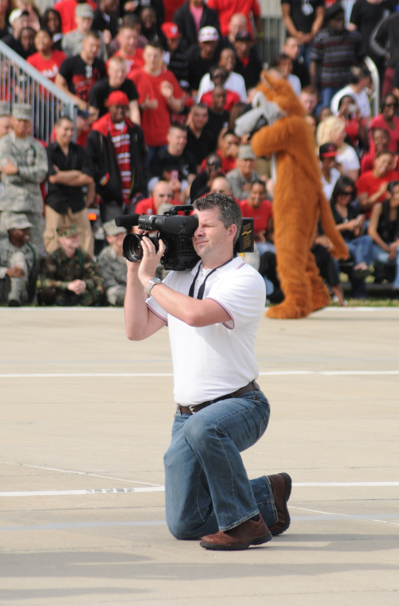 Videographer Jamie Foster films a recent 81st Training Group drill down.  (U.S. Air Force photo by Kemberly Groue)
