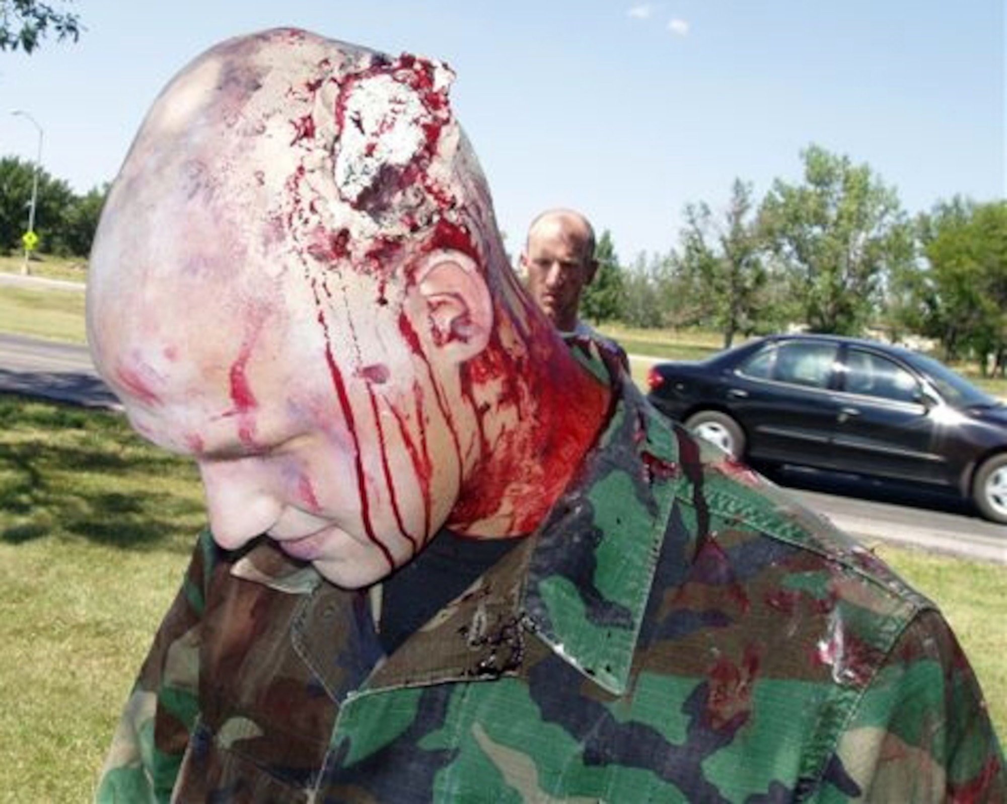 The 28th Medical Group Moulage Team helps create realistic injury effects for emergency responders at Ellsworth and communities in the local area. By creating wounds such as the scalp wound on this Airman, the team helps ensure responders are prepared for real-world emergency situations. (Courtesy photo/28 MDG Moulage Team)