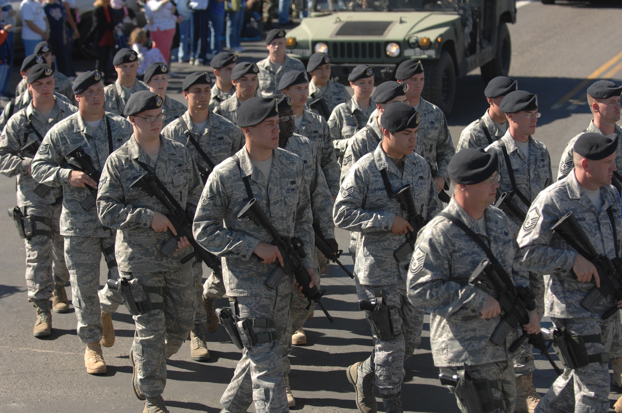 Airmen from the 17th Security Forces Squadron parade down Concho Avenue in San Angelo Nov. 8. The 17 SFS were accompanied by Humvees, all-terrain vehicles and military working dogs. (U.S. Air Force photo by Tech. Sgt. John Barton)