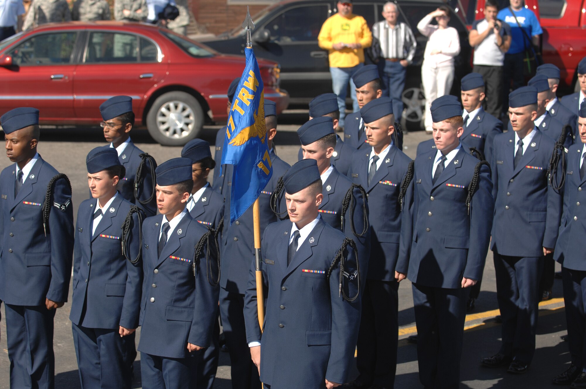Airmen from the 17th Training Group Black Rope Drill Team prepare to march during the San Angelo Veterans Day Parade Nov. 8. Airmen, Soldiers, Sailors, Marines and civilians from Goodfellow Air Force Base joined with members of the San Angelo community to form this year’s parade, which stretched several city blocks. (U.S. Air Force photo by Tech. Sgt. John Barton)