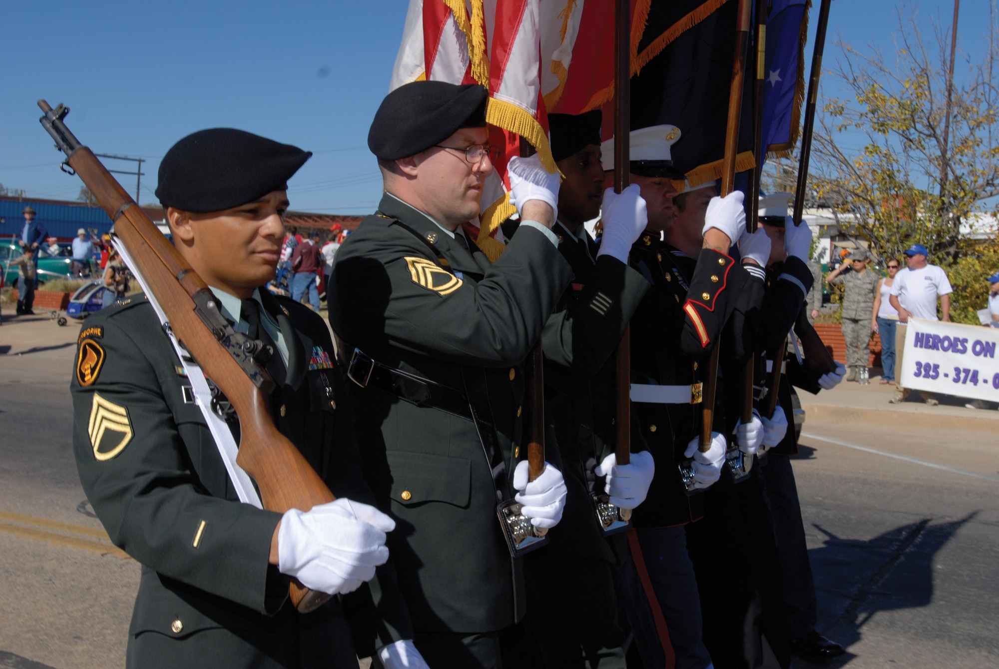 Members of the Goodfellow Air Force Base Joint Service Color Guard carry the colors proudly during the Veterans Day Memorial Nov. 8 at San Angelo Regional Airport Mathis Field. (U.S. Air Force photo by Master Sgt. Randy Mallard)