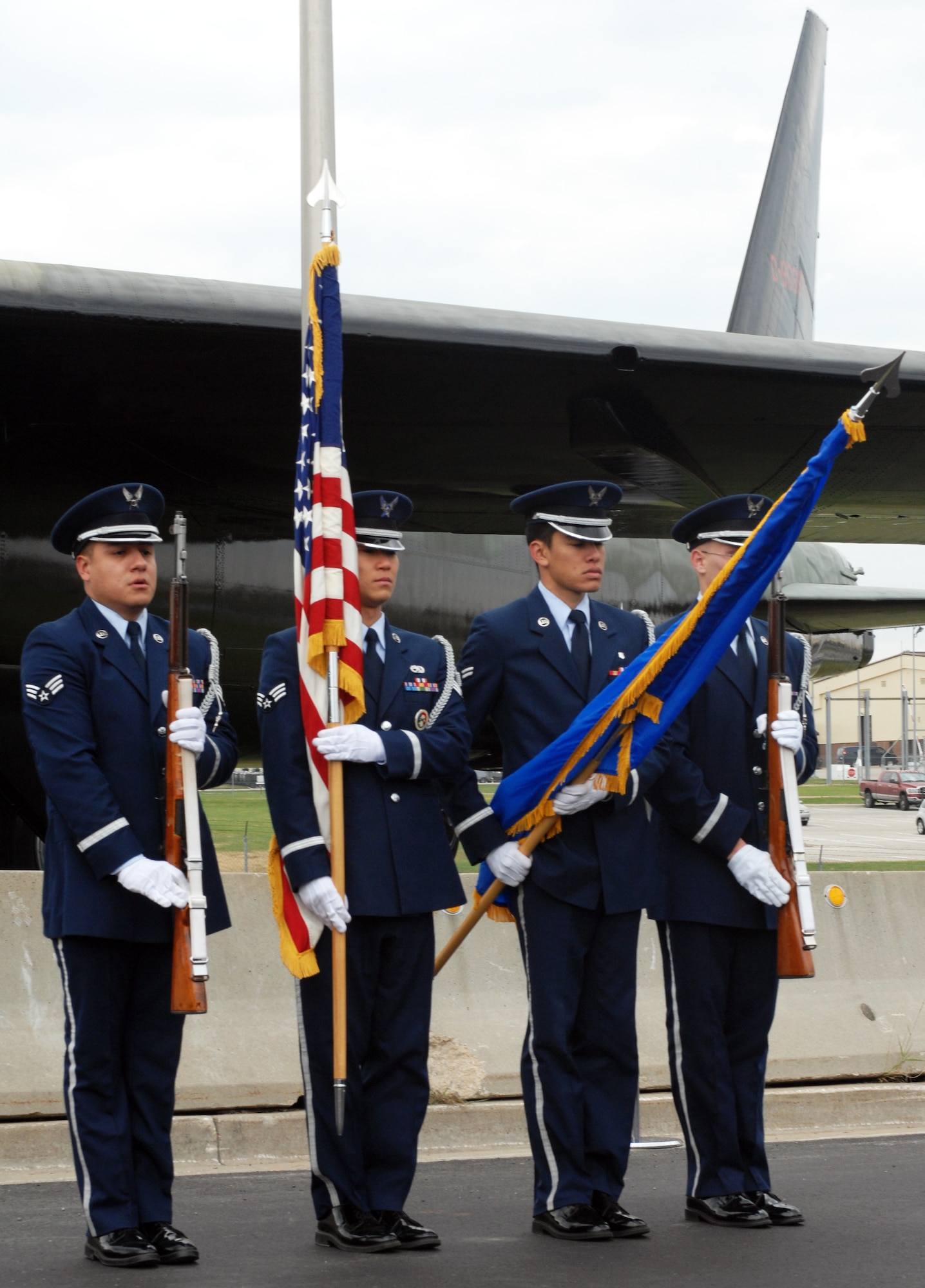 WHITEMAN AIR FORCE BASE, Mo. - Members of the Whiteman Honor Guard prepare to post the colors during the B-52 static display rededication ceremony Nov. 10. the B-52 was repainted and dedicated to Capt. Robert Morris, a B-52 pilot during the Linebacker II missions. Captain Morris and his crew shot down after their mission. (U.S. Air Force photo/Airman 1st Class Carlin Leslie) 