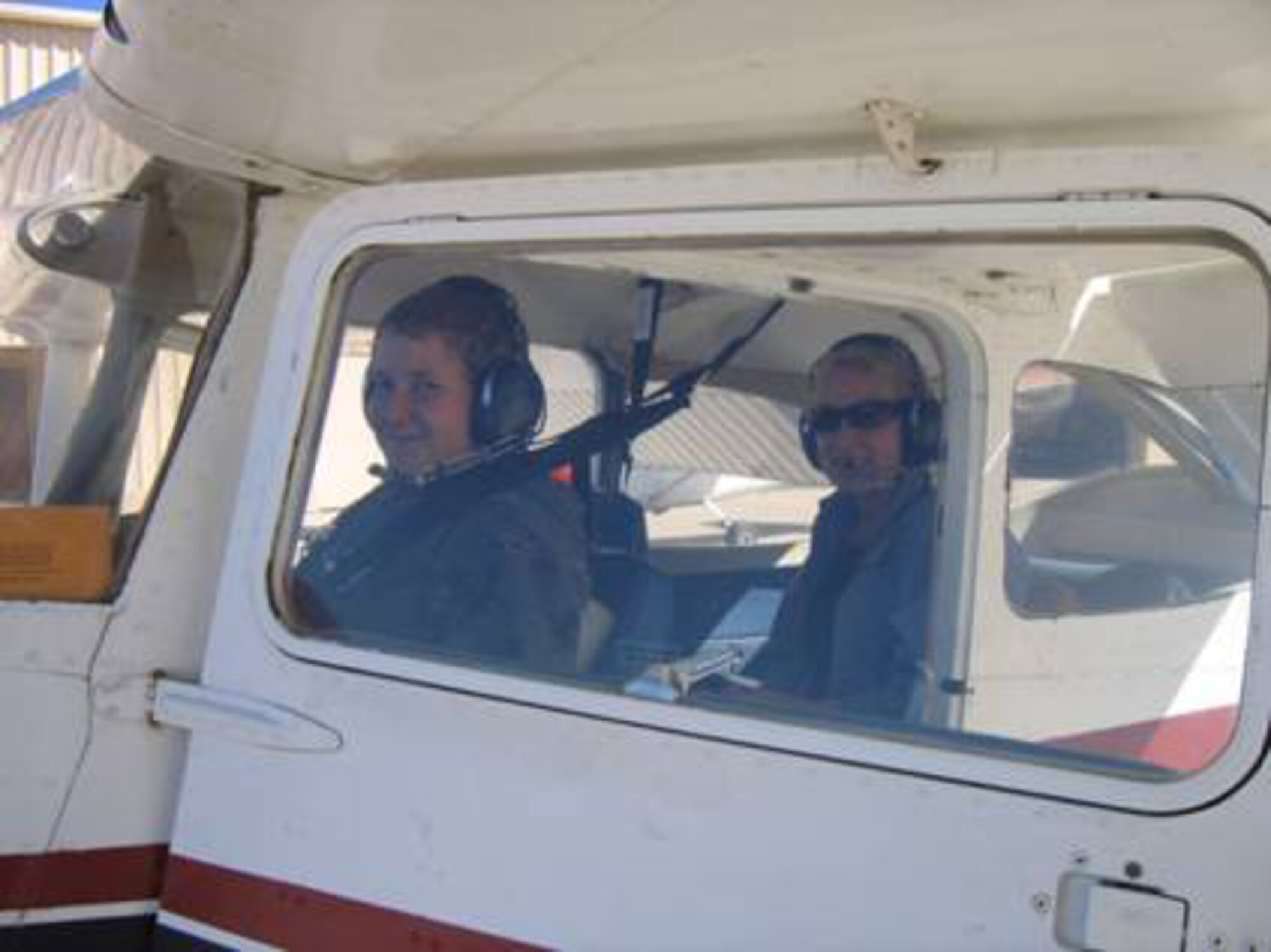 Team Holloman members, Justin Owen and his mother Kelley Owen, pose for a photo before taking to the skies for the first time at the Aero Club at Holloman Air Force Base, N.M., Oct. 22. (Photo provided)