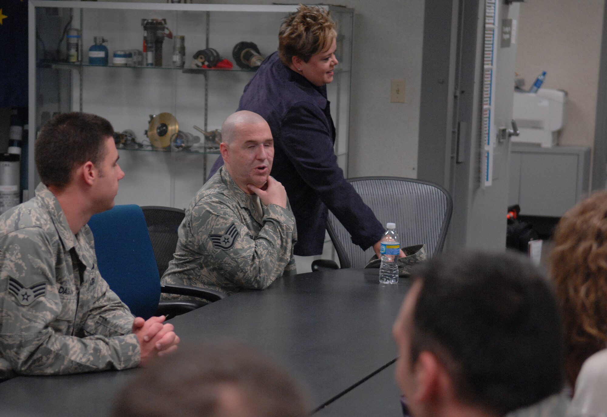 WHITEMAN AIR FORCE BASE, Mo. – Staff Sgt. Christopher Slaydon, 56th Civil Engineer Squadron, Luke Air Force Base, speaks with the Whiteman Explosive Ordnance Disposal Flight Nov. 6. Sergeant Slaydon recounted an IED he investigated October 24, 2007 outside Kirkuk Air Base that detonated.  As a result of the blast, he suffered traumatic amputation of his left arm above the elbow, his left eye was severely damaged and removed and his right eye was also severely damaged.  He is now totally blind without light perception.  Additionally, Sergeant Slaydon suffered multiple facial fractures including shattered orbits, fractured sinuses, two jaw fractures, a collapsed lung and several other injuries.  Sergeant Slaydon has been recovering from his injuries at Brooke Army Medical Center and The Center for the Intrepid since October 31, 2007. (U.S. Air Force photo/Senior Airman Stephanie Clark)

