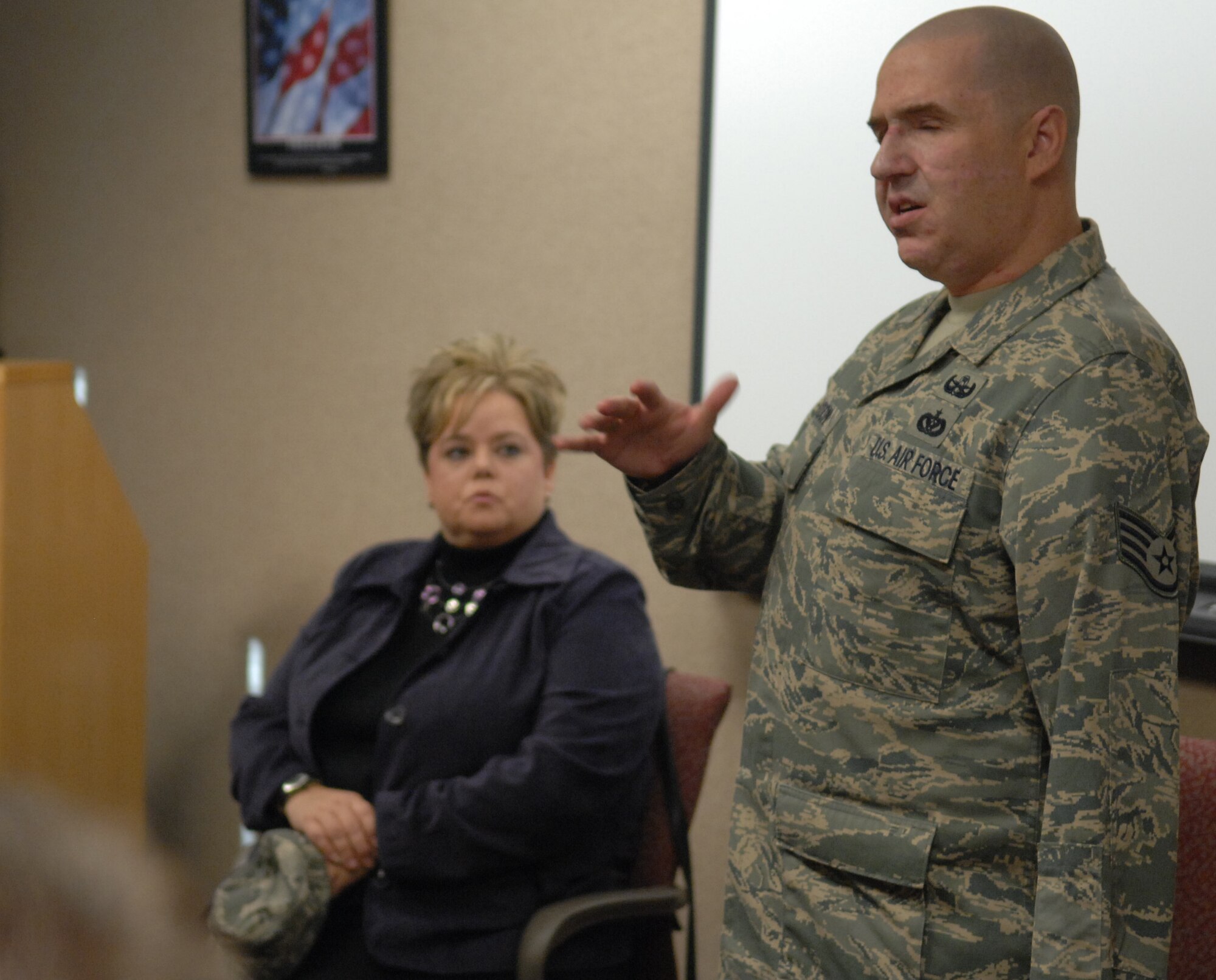 WHITEMAN AIR FORCE BASE, Mo. – Staff Sgt. Christopher Slaydon, 56th Civil Engineer Squadron, Luke Air Force Base, speaks to an Airman Leadership School class Nov. 6. Sergeant Slaydon recounted an IED he was investigated October 24, 2007 outside Kirkuk Air Base that detonated.  As a result of the blast, he suffered traumatic amputation of his left arm above the elbow, his left eye was severely damaged and removed and his right eye was also severely damaged.  He is now totally blind without light perception.  Additionally, Sergeant Slaydon suffered multiple facial fractures including shattered orbits, fractured sinuses, two jaw fractures, a collapsed lung and several other injuries.  Sergeant Slaydon has been recovering from his injuries at Brooke Army Medical Center and The Center for the Intrepid since October 31, 2007. (U.S. Air Force photo/Senior Airman Stephanie Clark)
