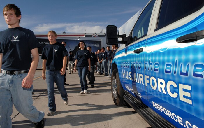 Air Force delayed entry program recruits march out to show center before they take their oath of enlistment during an air show at Nellis Air Force Base, Nev., Nov. 8, 2008. The Nellis AFB air show showcased the 21st-century Air Force’s capabilities in air, space and cyberspace. The show, held Nov. 8-9. is the largest aviation event in Las Vegas and the largest free public event in Nevada.
(U.S. Air Force Photo/Senior Airman Larry E. Reid Jr.)