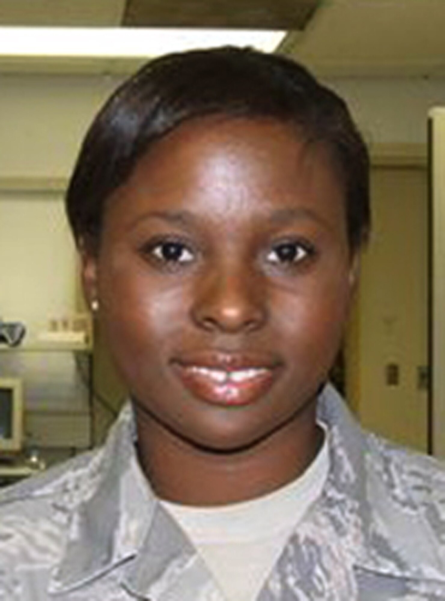 Airman 1st Class Andrea Bell, 81st Medical Group, scored 93 on her career development course test.  Other top scorers for October were Airman 1st Class Ariel Zuniga, 81st MDG, and Tech. Sgt. Timo-thy Hogan, 81st Civil En-gineer Squadron.  (U.S. Air Force photo by Kemberly Groue)
