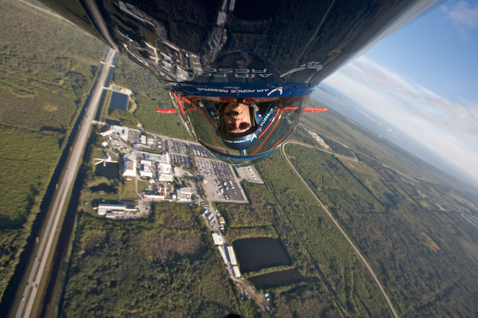 Lt. Col. Ed Hamill, 301st Fighter Squadron instructor pilot, flies the Air Force Reserve biplane over the Kennedy Space Center. Colonel Hamill, who is a reservist with the 944th Fighter Wing, was able to fly over the Space Shuttle Endeavor on launch pad A, which is scheduled to lift off Nov 14, 2008. (Courtesy photo) 