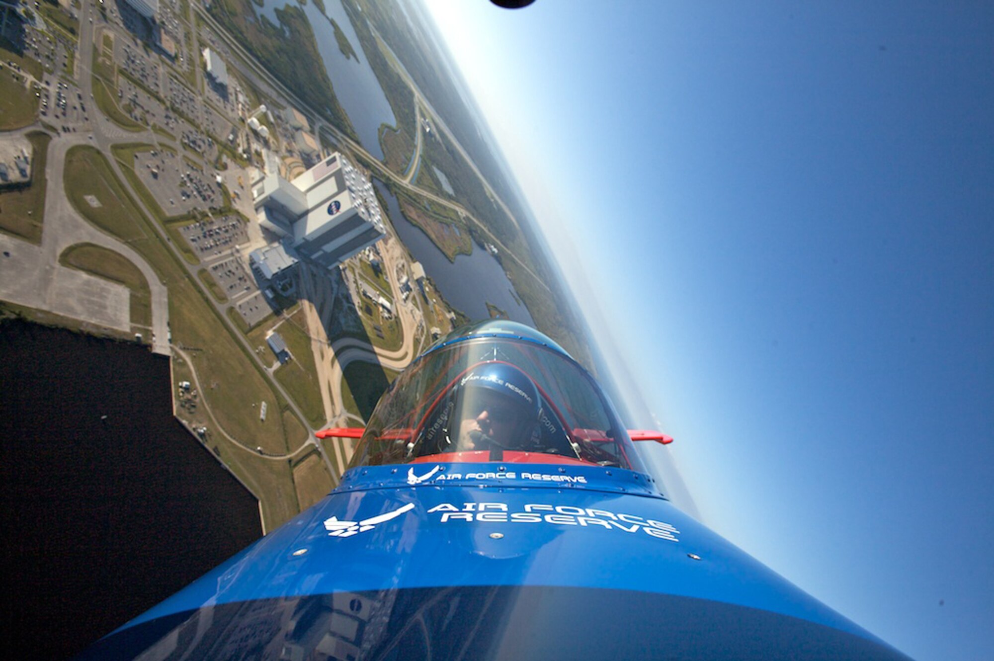 Lt. Col. Ed Hamill, 301st Fighter Squadron instructor pilot, flies the Air Force Reserve biplane over the Kennedy Space Center. Colonel Hamill, who is a reservist with the 944th Fighter Wing, was able to fly over the Space Shuttle Endeavor on launch pad A, which is scheduled to lift off Nov 14, 2008. (Courtesy photo) 