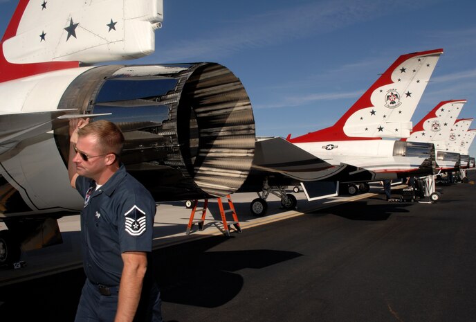 Master Sgt. Daryl Page, U.S. Air Force Air Demonstration Squadron, the Thunderbirds, specialist section chief, finalizes his aircraft inspection prior to the Thunderbirds performance during an air show at Nellis Air Force Base, Nev., Nov. 8, 2008. The Nellis AFB air show showcased the 21st-century Air Force’s capabilities in air, space and cyberspace. The show, held Nov. 8-9. is the largest aviation event in Las Vegas and the largest free public event in Nevada.
(U.S. Air Force Photo/Senior Airman Larry E. Reid Jr.)