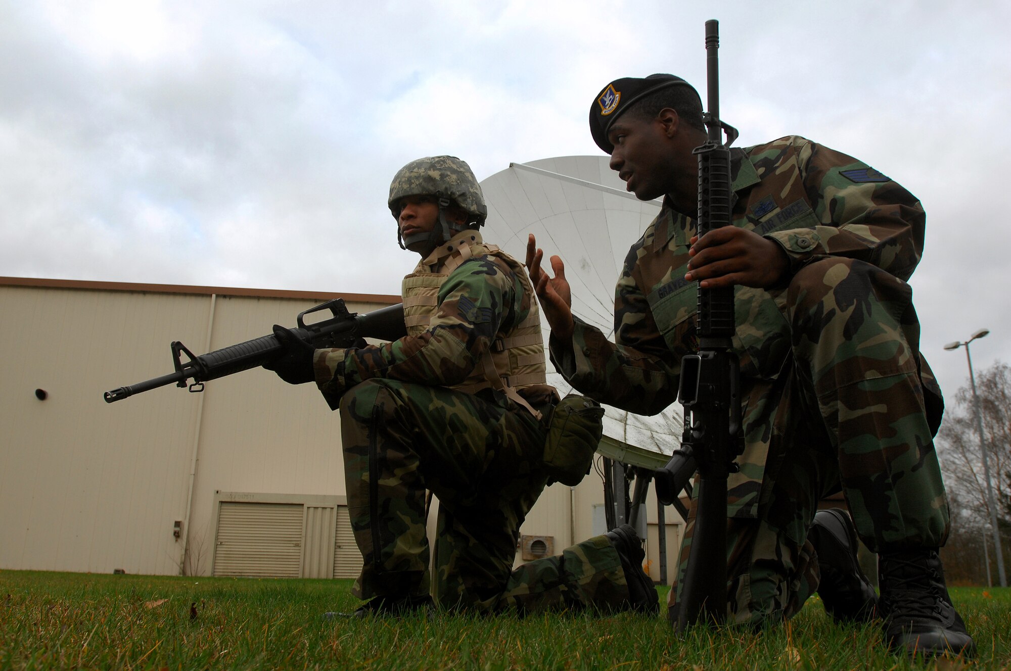 Senior Airman James Whyte, 435th Communications Squadron, receives instruction from Staff Sgt. Robert Graves, 435th Security Forces Squadron lead training instructor, during combat skills training Nov. 12, 2008, Einseidlerhof, Germany. Airmen participated in a two day Combat Skills Training course in preparation for deployment. (U.S. Air Force photo Airman 1st Class Kenny Holston)