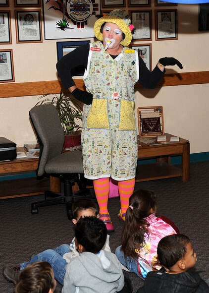 The Airman and Family Readiness Center provided a clown for entertainment for the children who attended the Military Family Month Appreciation celebration, Nov. 7, at Holloman Air Force Base, N.M. The clown performed and told stories for the children. (U.S Air Force Photo/ Airman 1st Class DeAndre Curtiss)