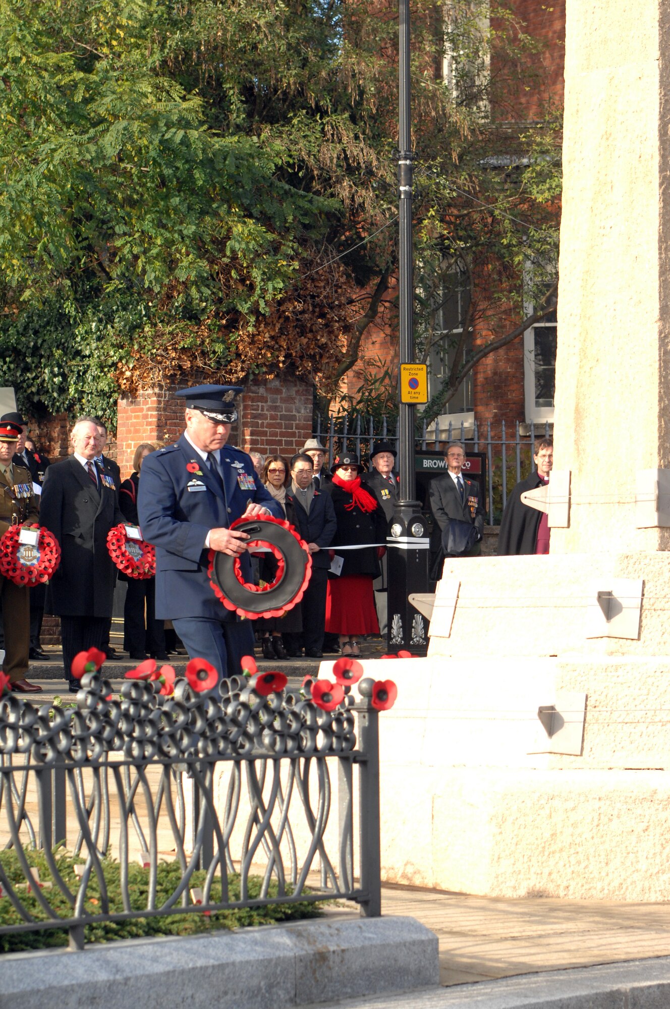 Brig. Gen. Kevin Henaberay, filling in for Maj. Gen. Jack Egginton, 3rd Air Force United Kingdom vice commander, lays a poppy wreath during the Remembrance Day ceremony at Angel Hill, Bury St. Edmunds Nov. 9, 2008. Remembrance Day originally started to honor those who lost their lives or were injured during World War I with the tradition of wearing red poppies on civilian clothing and laying poppy wreaths at memorial sites. (U.S. Air Force photo by Senior Airman Teresa M. Hawkins)