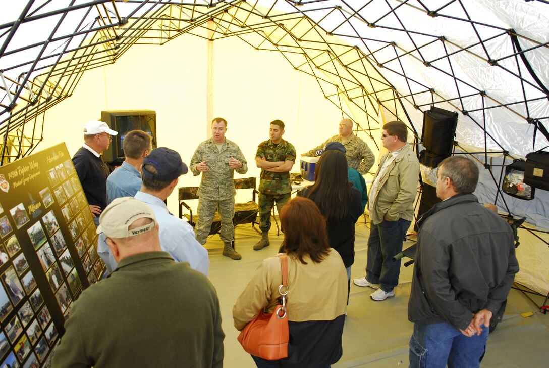 Air Force Capt Harold Hill discusses the capabilities of the Small Portable Aeromeical Rapid Response team during the annual Employer Support of the Guard and Reserve Bosse's Day.  Civilian employers of Texas Air National Guard members got an in depth look at various units during familiarzation tours and climbed aboard a KC-135 to view an aerial refueling mission.  The event was hosted by the 149 Fighter Wing at Lackland AFB, Texas. 