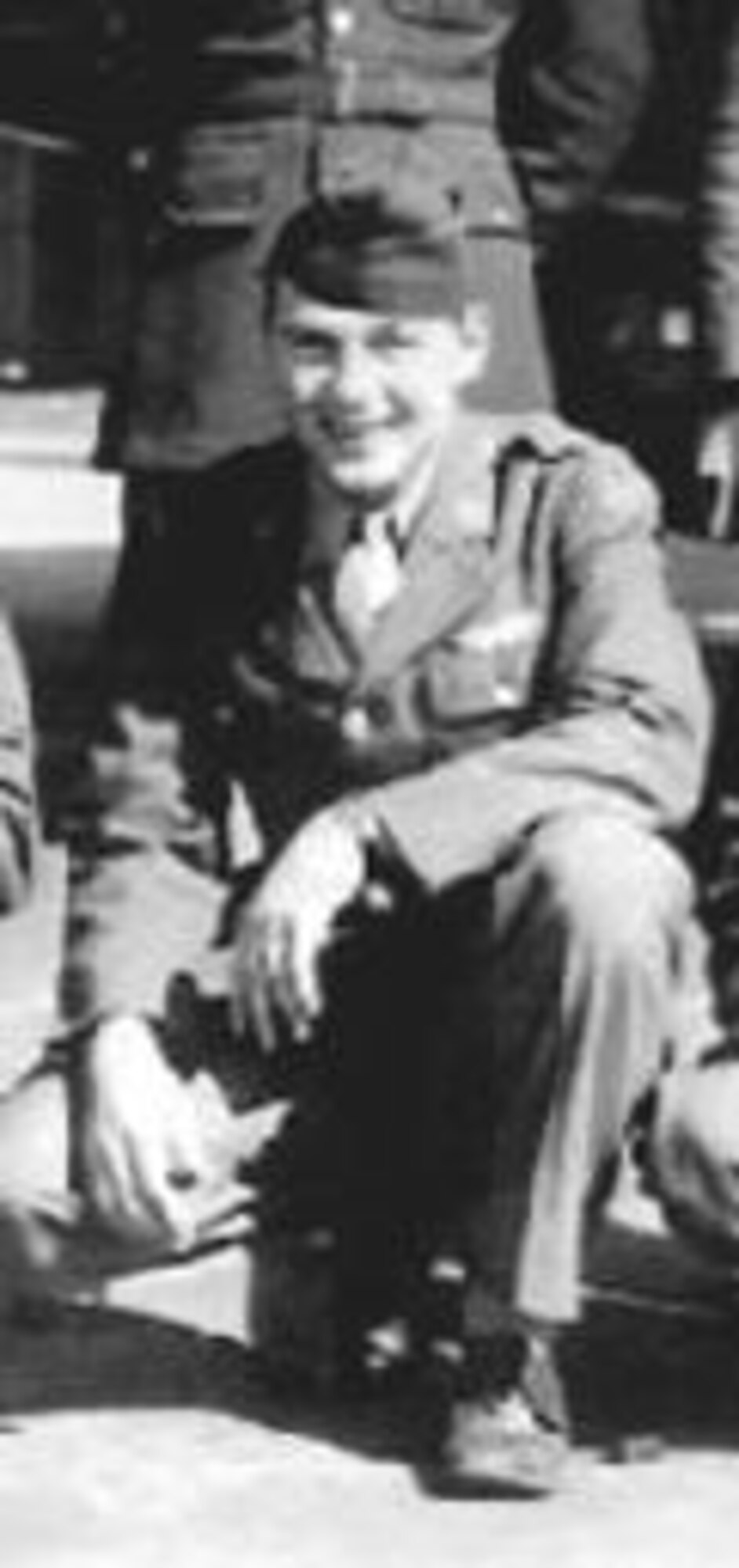 Sergeant Thomas I. Akens is pictured in March 1945 as his B-17G crew formed up in the U.S. prior to flying the Atlantic to join the 303rd Bomb Group (Heavy) at Molesworth, England.  Ms. Kelly Akens, the sergeant's granddaughter visited her grandfather's old base on November 7, 2008.  The base is now home to the JIOCEUR Analytic Center. (Photo courtesy 303rd Bomb Group Association)