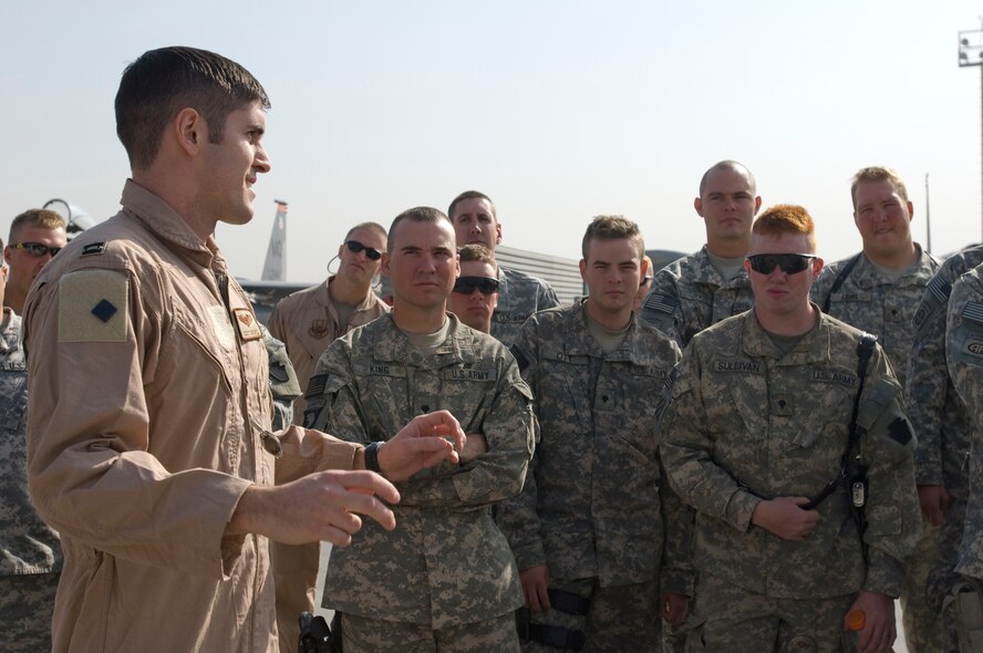 BAGRAM AIR FIELD, Afghanistan -- Capt. Scott Crowell, an F-15E Strike Eagle pilot, gives an aircraft tour to Pennsylvania Army National Guard Soldiers during a recent visit to Bagram's fighter squadrons. Members from the 391st Expeditionary Fighter Squadron and A-10 75th Expeditionary Fighter Squadron hosted the visit after the Soldiers had expressed a desire to thank the pilots who protect ground forces with close-air support while engaged in fire fights with enemy forces. (U.S. Air Force photo/Master Sgt. Keith Brown)