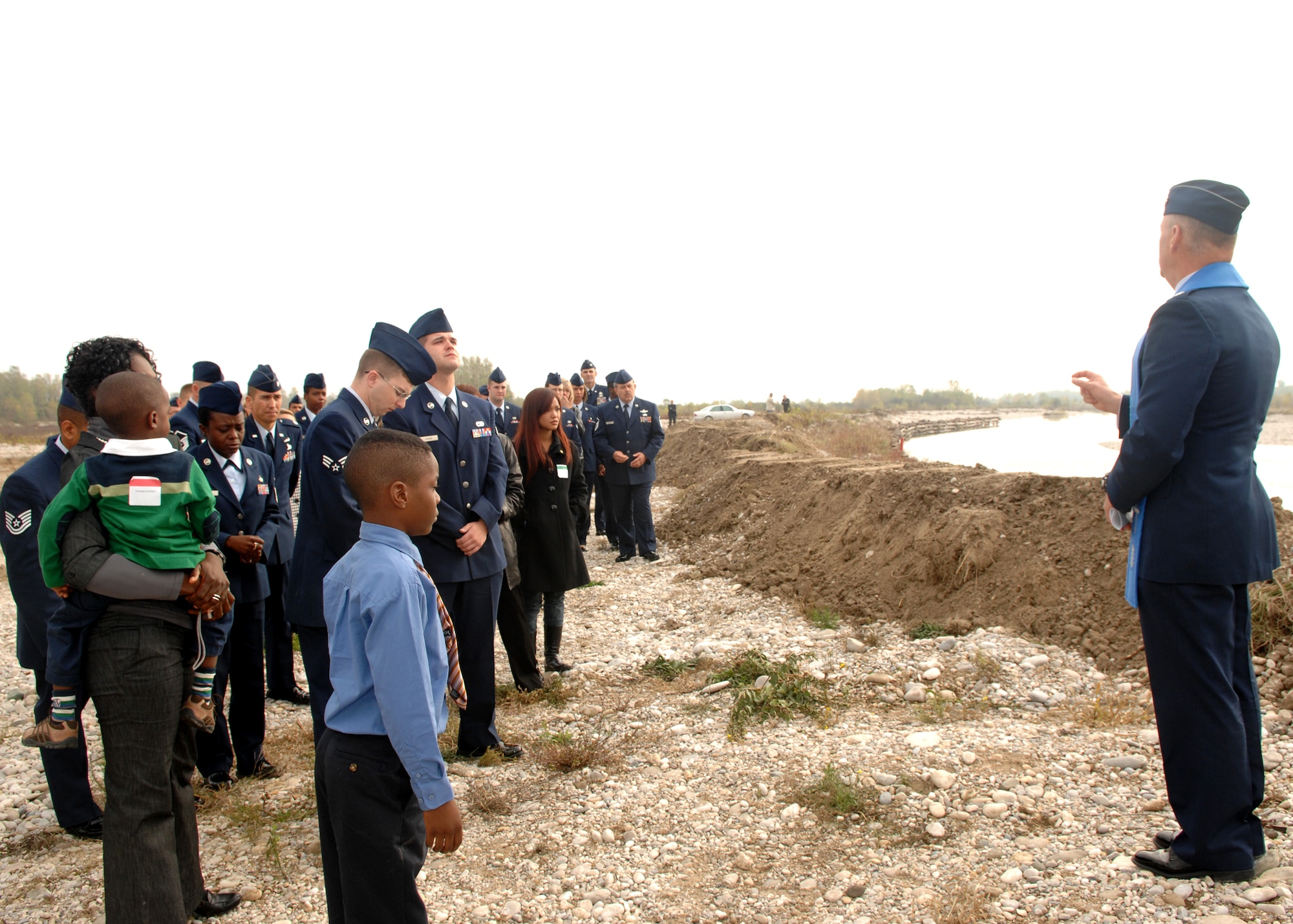 Lt. Col. Jim Browning, 31st Fighter Wing chaplain, speaks to family members and survivors of the UH-60 Helicopter crash that happened in Santa Lucia di Piave, Italy, one year ago at the crash site on Nov. 8. Members of the Aviano Air Base and Santa Lucia di Piave communities gathered in the town later that morning to unveil a memorial honoring both the crash victims as well as the thousands of Italians who lost their lives in the Piave River in World War I. (U.S. Air Force photo/Senior Airman Taylor Marr)