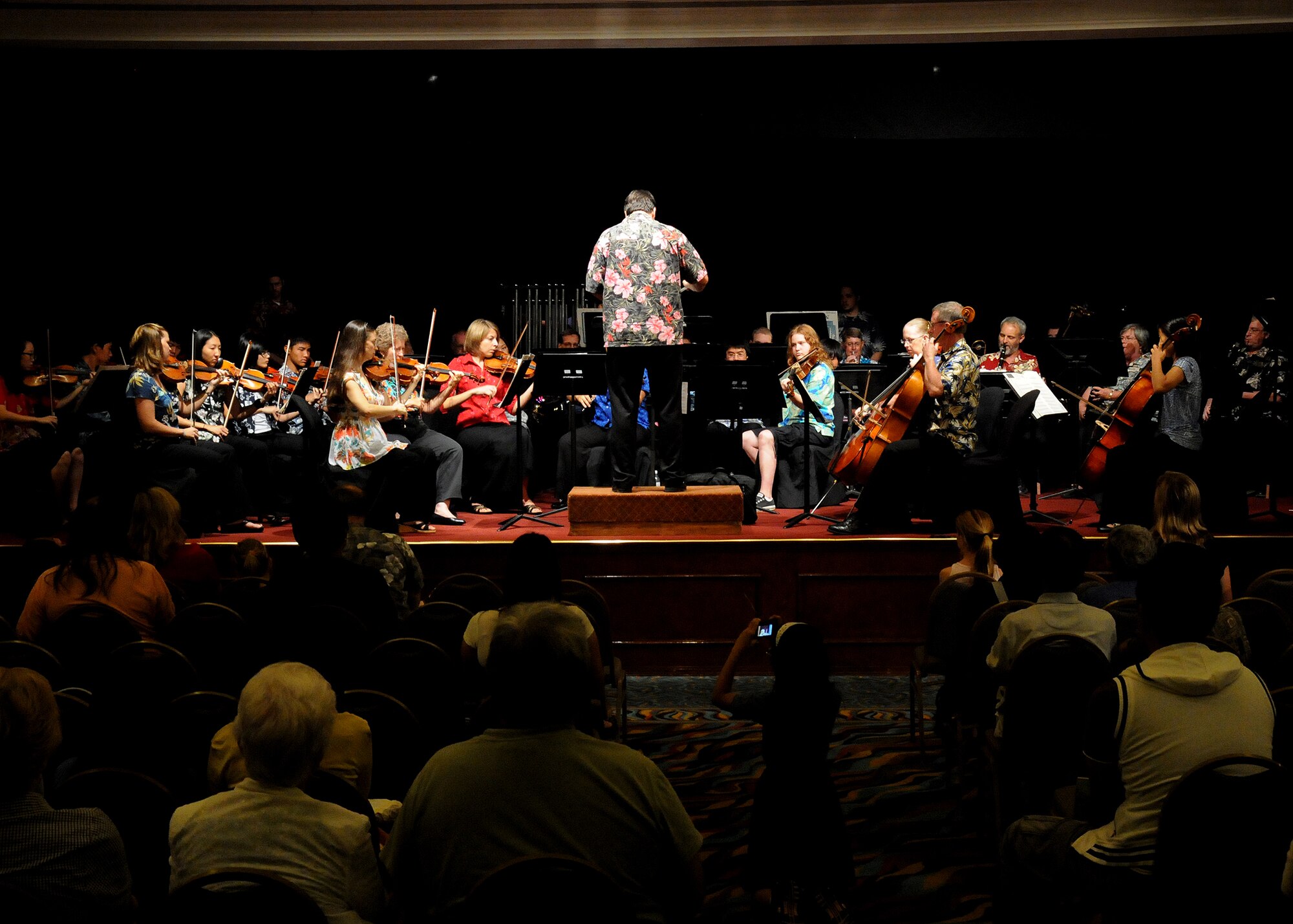 ANDERSEN AIR FORCE BASE, Guam - Captain April Bowman, 554th RED HORSE Squadron, Lead Engineer and Cellist for the Guam Symphony Society performs at the Hilton Guam Resort during the Harmony Fair Nov. 11. Captain Bowman started pleaying the piano when she was 5 years old and then started playing the cello when she was 10 years old. (U.S. Air Force photo by Airman 1st Class Nichelle Griffiths) 