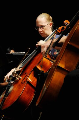 ANDERSEN AIR FORCE BASE, Guam - Captain April Bowman, 554th RED HORSE Squadron and Cellist for the Guam Symphony Society  performs at the Hilton Guam Resort during the Harmony Fair Nov. 11.Captain Bowman also knows how to play the piano, violin, guitar, trumpet and drums (U.S. Air Force photo by Airman 1st Class Nichelle Griffiths) 