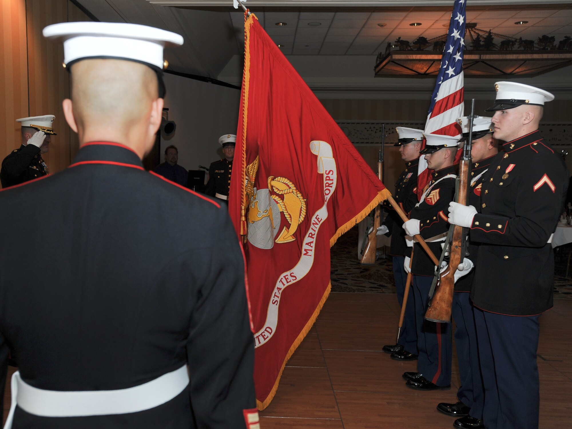 ANCHORAGE, Alaska -- Color Guard for the U.S. Marine Corps, Company D (-) Anti Terrorism Battalion, stand at attention during the playing of the national anthem at the beginning of the Marine Corps Birthday Ball at the Sheraton Hotel in Anchorage. Alaska Senator Charlie Huggins was the guest speaker for the event. (U.S. Air Force photo/Staff Sgt. Joshua Garcia)