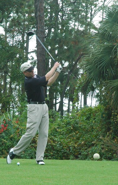 Brig. Gen. Darryl Roberson, 325th Fighter Wing commander, prepares to drive a golf ball during the Military Affairs Committee golf tournament here today.  Community leaders paired up with military members to not only enjoy a day golfing, but to become educated on Tyndall Air Force Base’s mission and day-to-day operations.  (U.S. Air Force photo by Airman 1st Class Veronica McMahon)