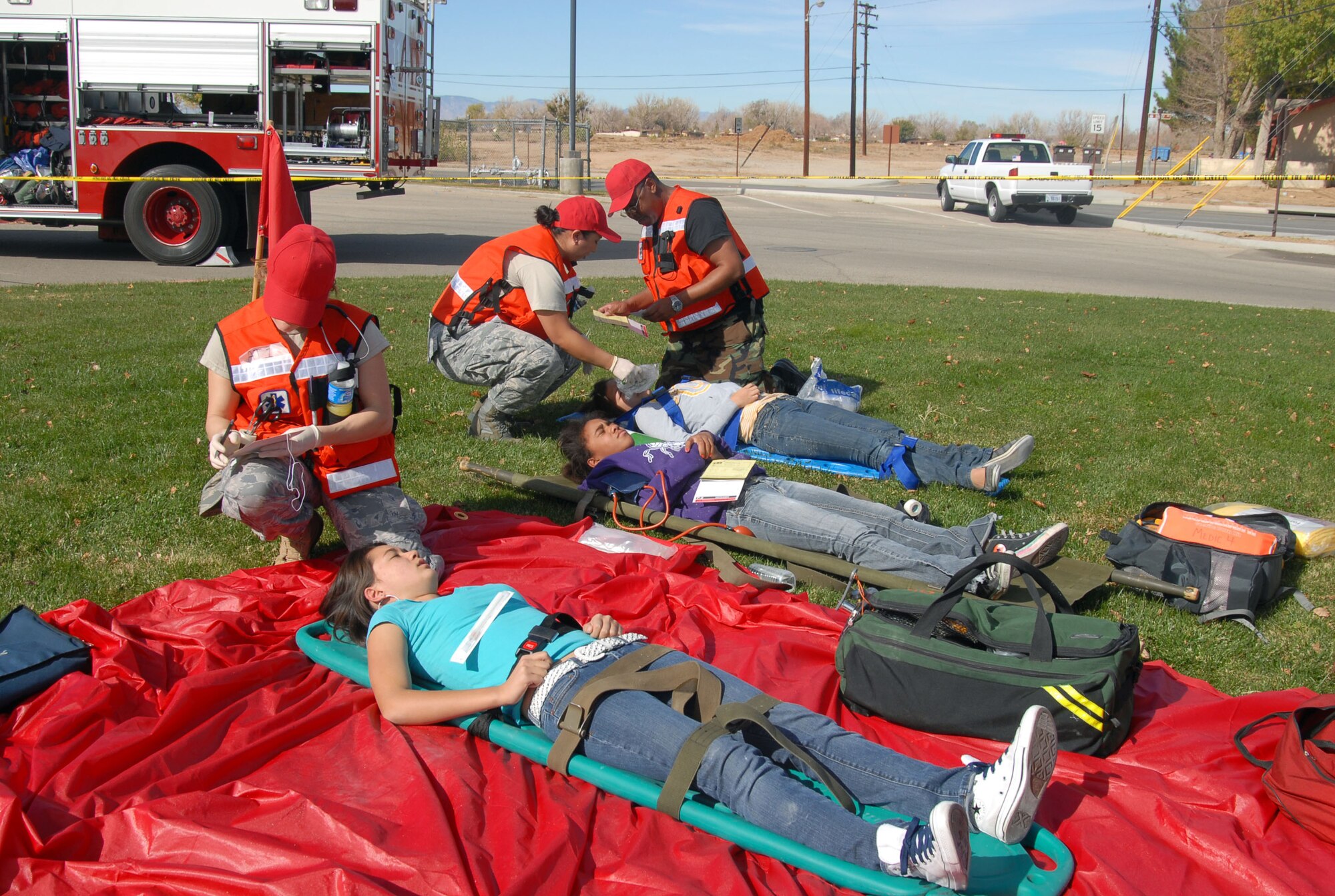 Medics with the 95th Medical Group perform triage on victims of a simulated magnitude 7.8 earthquake as part of the Great Southern California Shakeout drill Nov. 13. The exercise ran concurrently the Golden Guardian 2008, the nation's largest state sponsored emergency response exercise. The statewide exercise involved more than 5,000 first responders from dozens of state, local and federal agencies. (Air Force photo by Senior Airman Julius Delos Reyes)