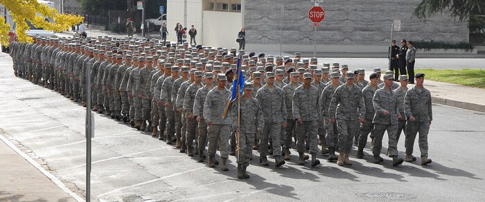 More than 250 Beale Airmen march in a mass formation at the Marysville Vetarans Day parade Nov. 11. Together with base volunteer coordinators, wing leadership and individual squadron participation, there were more than 320 Beale particpants in the parade. (Photo by Sean Bhakta)