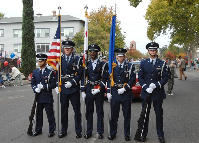Beale Air Force Base's honor guard stands ready to lead the base volunteers marching in the Marysville Veterans Day parade Nov. 11. More than 260 Airmen participated in the parade, from 9th Security Forces to the 9th Physiological Support Squadron. (Photo by Sean Bhakta)