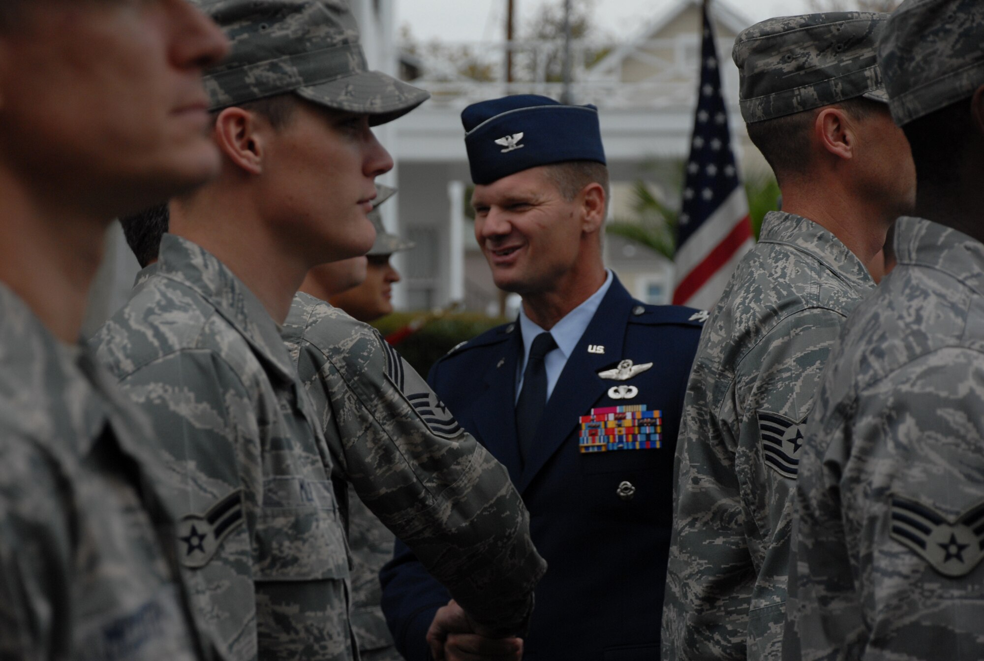 Col. Keith Gentile, 9th Reconnaissance Wing vice commander, talks with Beale Airmen at the Marysville Veterans Day parade Nov. 11. About 260 Airmen participated in the parade, in a mass formation. (Photo by Staff Sgt. Sarah Gregory)