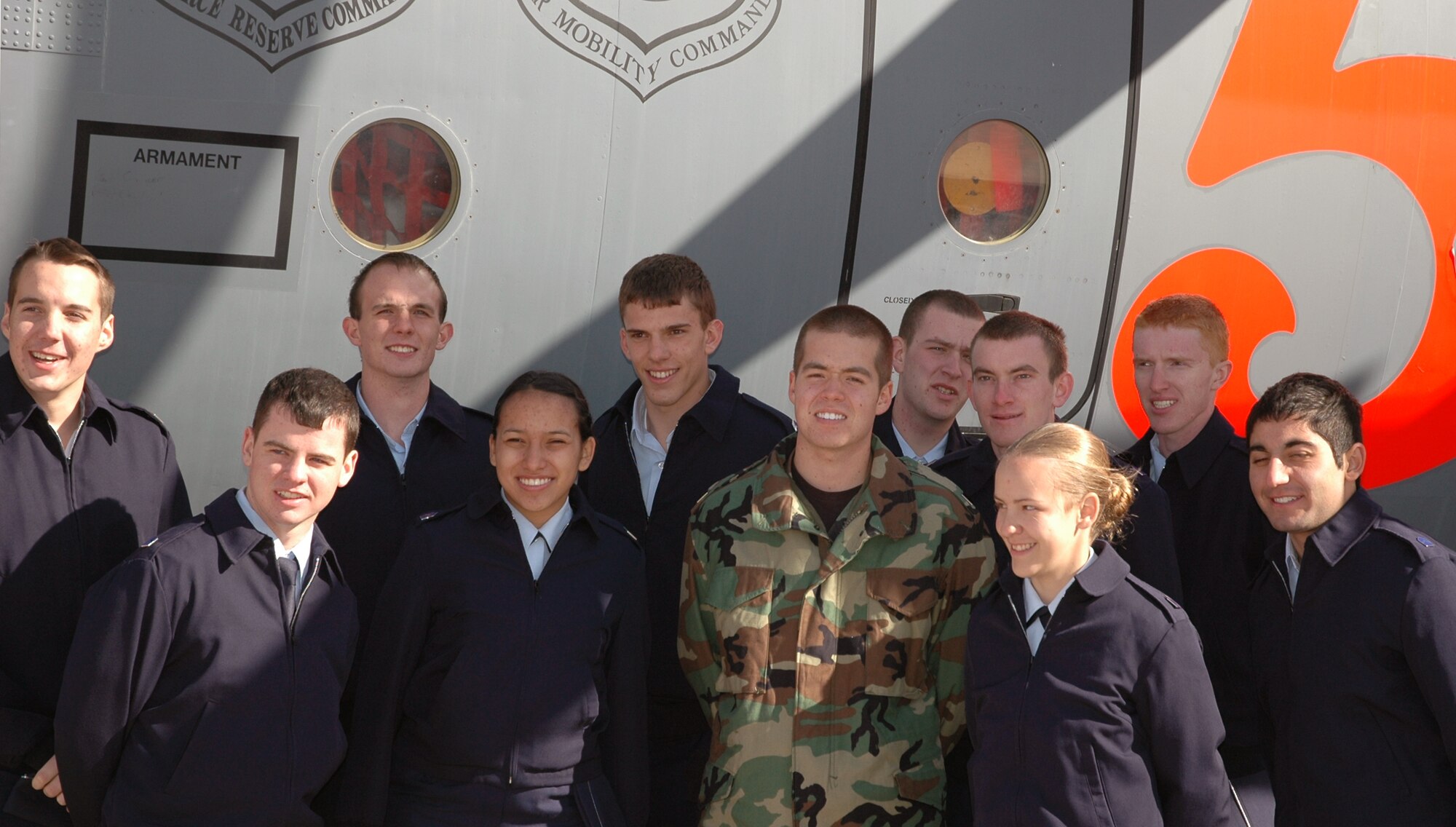 Students from Colorado State University Air Force ROTC detachment 90 take a final head count prior to boarding C-130 Hercules aircraft for a static tour with the 302nd Airlift Wing on Nov . 14 at Peterson Air Force Base, Colo. . The cadets spent the morning attending briefings on various career and service opportunities within the Air Force Reserve and Active Duty. (U.S. Air Force photo/ Sgt. Derrick M. Gildner) 
