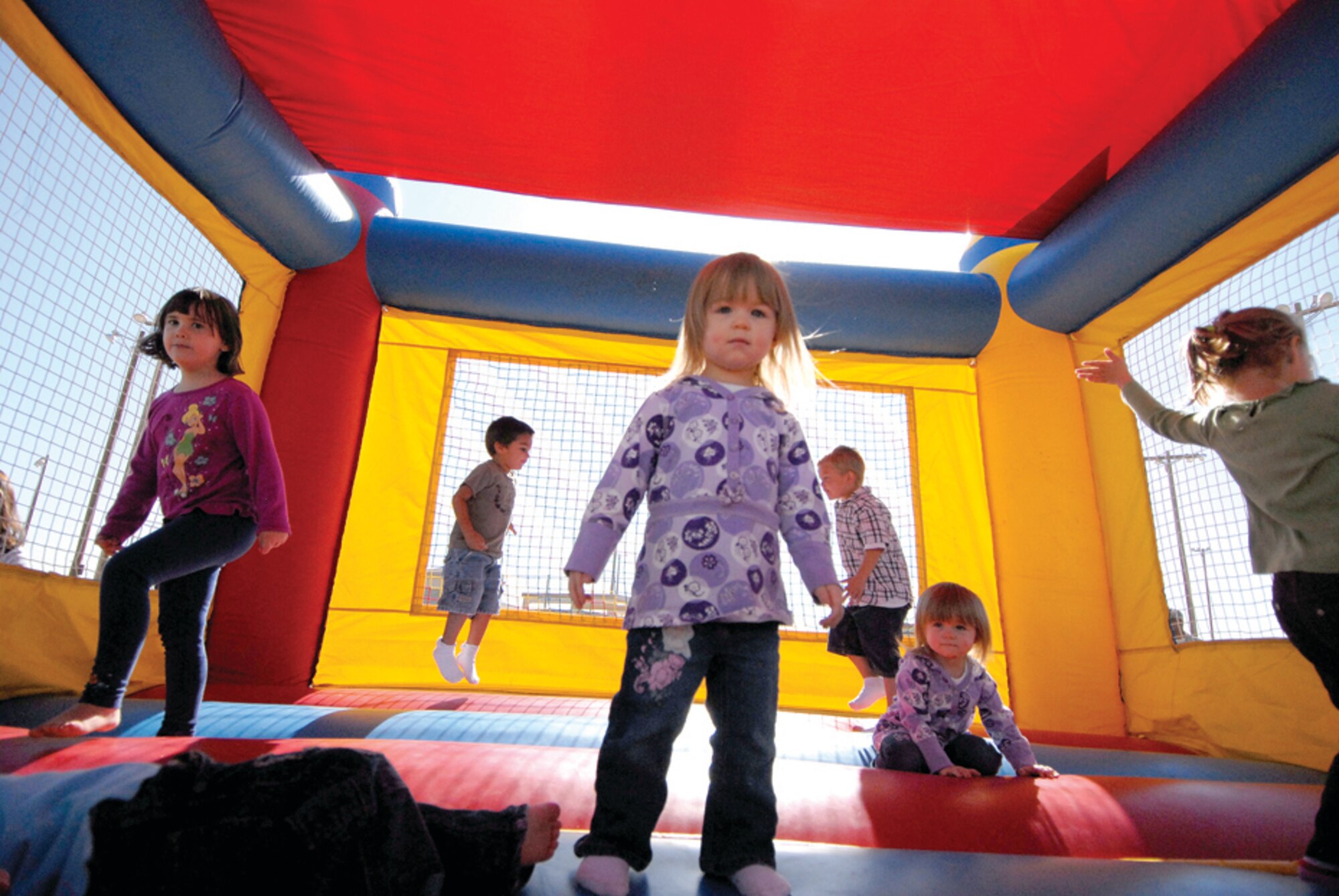Bouncy castles were set up at the base Wingman Day picnic for children to jump, bounce and play in.  (U.S. Air Force photo/ Deborah Silliman-Wolfe.)