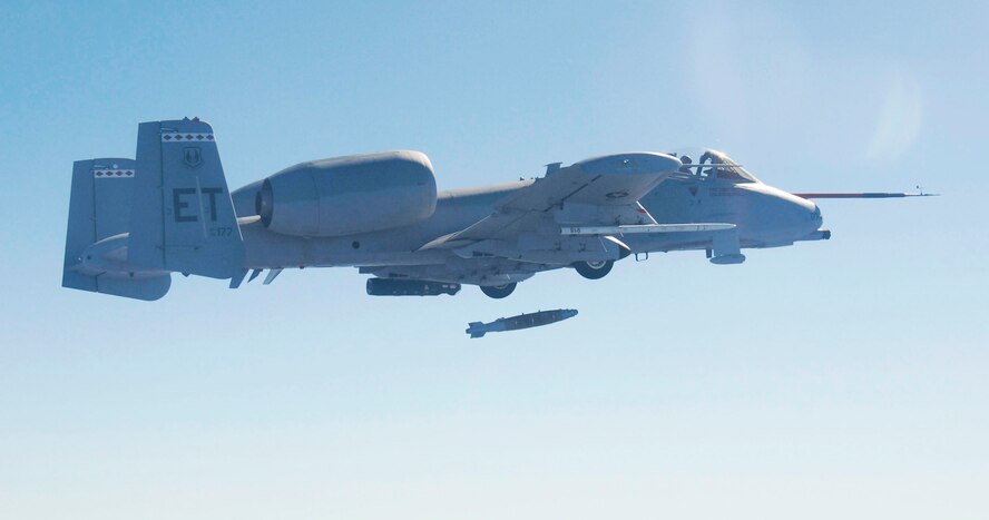 Maj. Matthew Domsalla, flying an A-10C Thunderbolt II Nov. 5, makes the first ever drop of a Laser Joint Direct Attack Munition, or LJDAM, from an A-10. This test proved a successful integration of the munition with the A-10, allowing for an outstanding precision targeting capability that will help Air Force aircrews continue to provide effective air support to coalition ground troops. Major Domsalla is with the 40th Flight Test Squadron at Eglin Air Force Base, Fla.  (U.S. Air Force photo/Master Sgt. Joy Josephson)