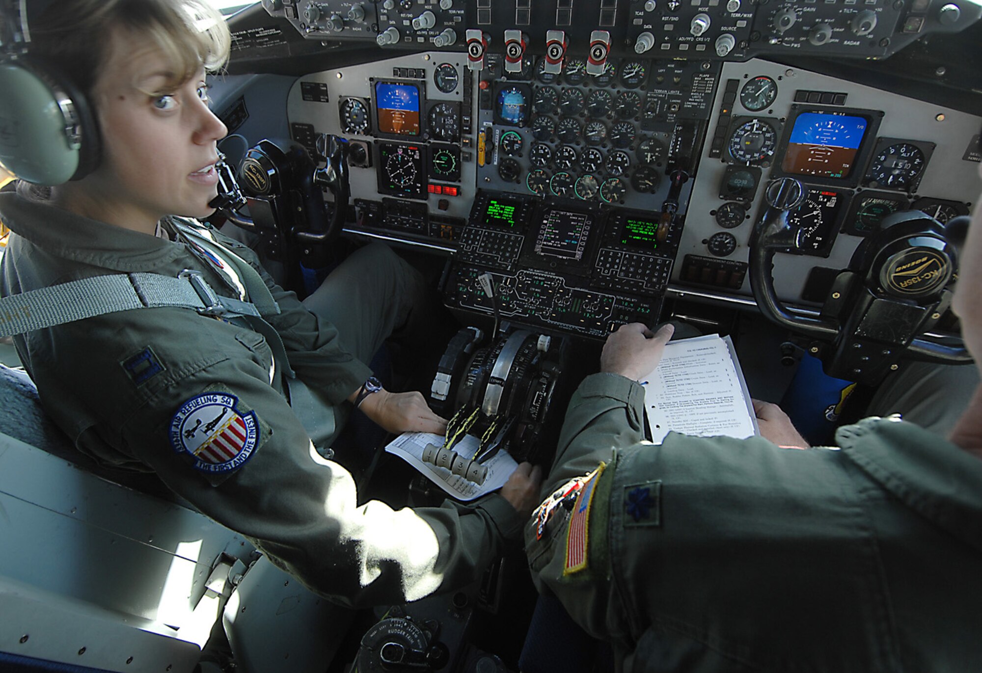 Capt. Kimberly Link, a pilot from the 336th Air Refueling Squadron, preflight checks a KC-135R Stratotanker at March Air Reserve Base prior to a Media Flight for Los Angeles Air Force Week, Nov. 12. (Photo by Master Sgt Rick Sforza)
