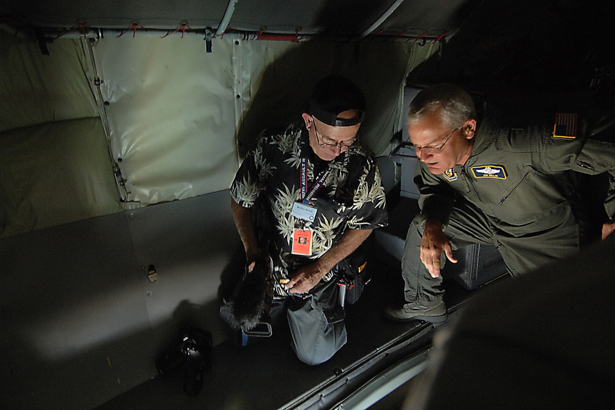 Brig. Gen. James Melin, right, looks at video shot by photographer Mike Mullen, from the San Gabriel Valley Newspaper Group, aboard  a KC-135R Stratotanker out of March Air Reserve Base, Calif., during a refueling mission and Media Flight as part of Los Angeles Air Force Week, Nov. 12. General Melin is the Wing Commander of the 452nd Air Mobility Command at March Air Reserve Base. (Photo by Master Sgt Rick Sforza)

