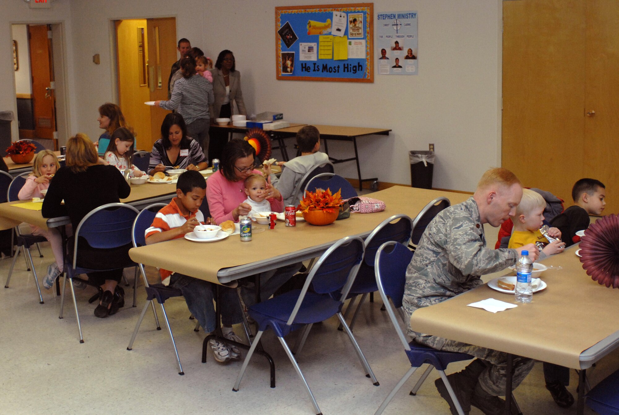 Families of deployed members and members of Holloman?s Key Spouses Club and their families enjoy a Families Apart Dinner of soups and bread at the Chapel at Holloman Air Force Base, N.M., Nov. 12. The Airman and Family Readiness Center holds a Families Apart Dinner at least every quarter for spouses and children of deployed members to get together and enjoy a dinner and crafts. This meal was sponsored by Holloman?s Key Spouses. (U.S. Air Force photo/Airman Sondra M. Escutia)
