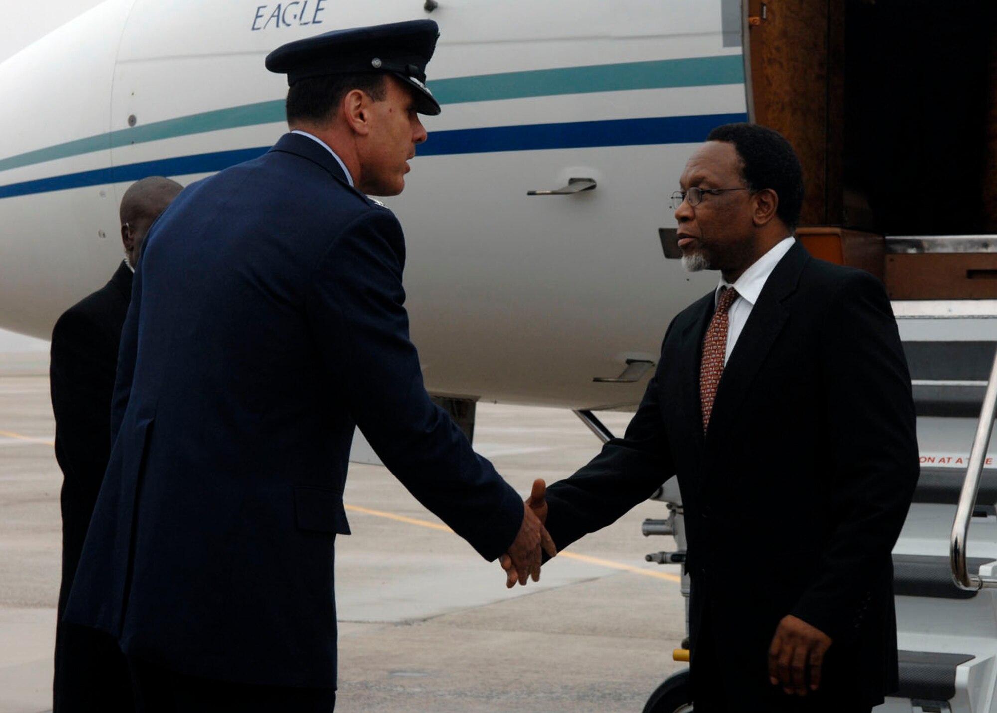 Colonel Steven M. Shepro, 316th Wing commander, greets South African President Kgalema Motlanthe at Andrews Air Force Base, Md., Nov. 14, 2008, for the two-day G20 Summit at the White House in Washington. The summit, hosted by U.S. President George W. Bush, will bring together world leaders to discuss the increasing global financial crisis, its causes and efforts to resolve it. (U.S. Air Force photo by Senior Airman Melissa Stonecipher)