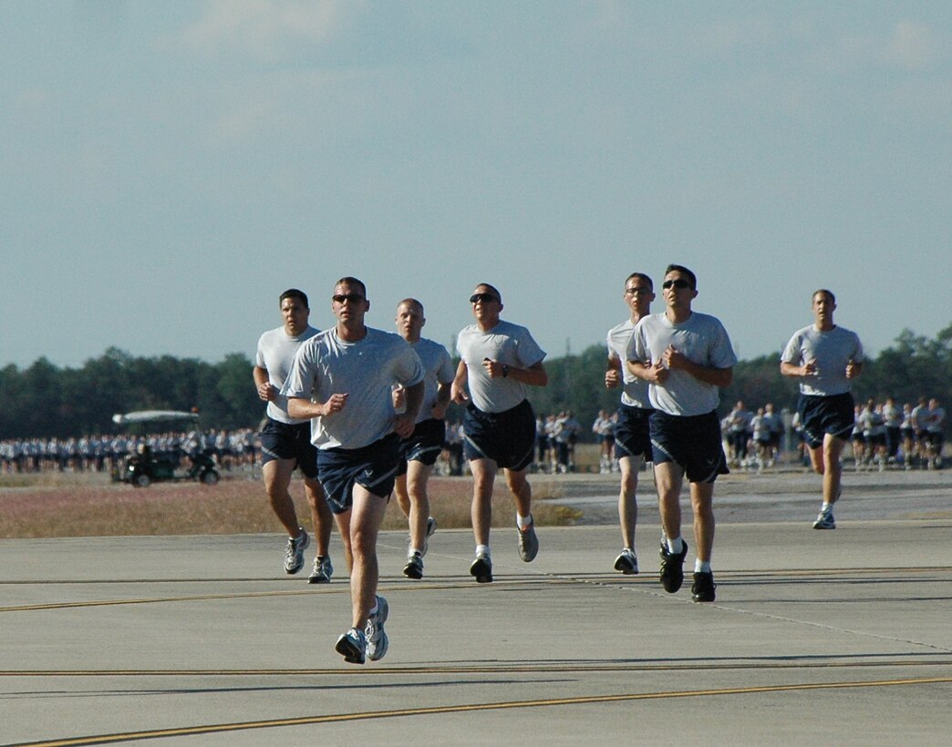 More than 1,000 personnel of the 33rd Fighter Wing ran more than two miles as a unit in their own Wingman Day afternoon event Nov. 6. Team Eglin leadership created the day to help foster culture of Airmen helping Airmen. The 33rd FW Nomads competed in base-wide challenges as well as having their own physical activity on the created track around their facilities and flightline. (U.S. Air Force Photo/Senior Airman Brian Miles)