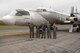 The crew for the final flight of the U.S. Air Force C-131 known as the Total-In-Flight Simulator, pose near a restoration hangar at Wright-Patterson Air Force Base, Ohio Nov. 7.  The unusual aircraft flew 2500 research flights and contributed to the advancement of many of the flight technologies integral to today’s fleet.  Prior to its retirement, the TIFS, a  1955 Convair, was the oldest operating aircraft in the Air Force inventory.  The aircraft will join the National Museum of the United States Air Force collection. (U.S. Air Force photo/Ben Strasser)