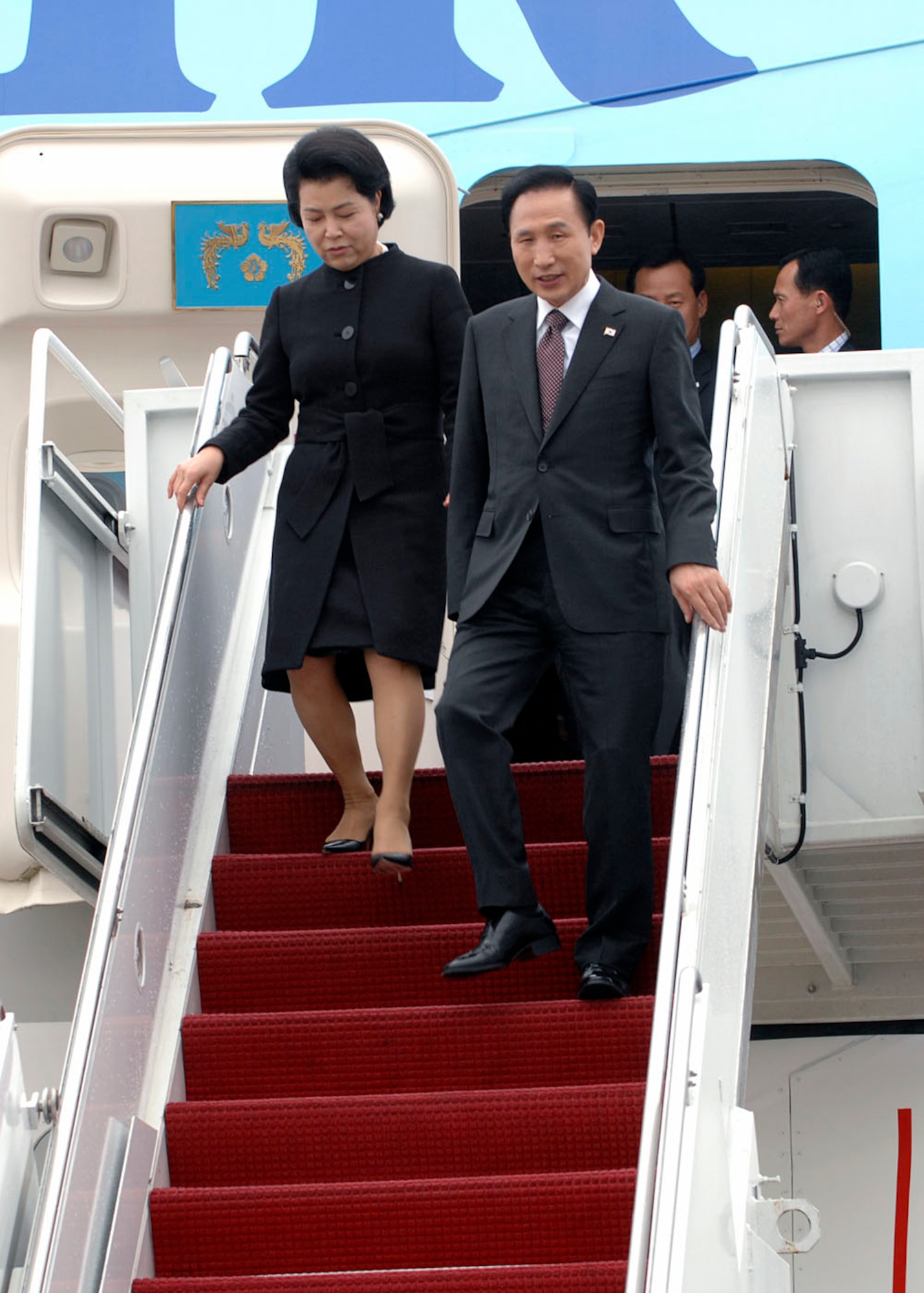 South Korean President Lee Myung-bak  and First Lady Kim Yun-ok land at Andrews Air Force Base Md., Nov.14, 2008, for the two-day G20 Summit at the White House in Washington. The summit, hosted by U.S. President George W. Bush, will bring together world leaders to discuss the increasing global financial crisis, its causes and efforts to resolve it. (U.S. Air Force photo by Tech. Sgt. Craig Clapper)