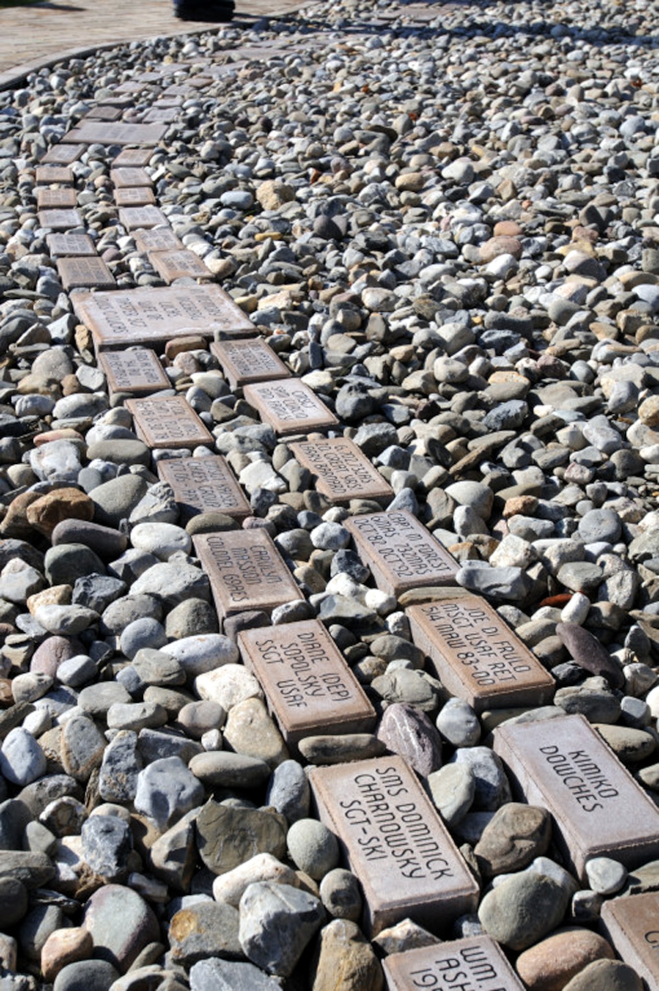 Memorial bricks outline the path around the C-141 at Starlifter Memorial Park. Each brick memorializes a family member and/or a friend who served on the C-141. (Photo courtesy of Kimberly Peterson)