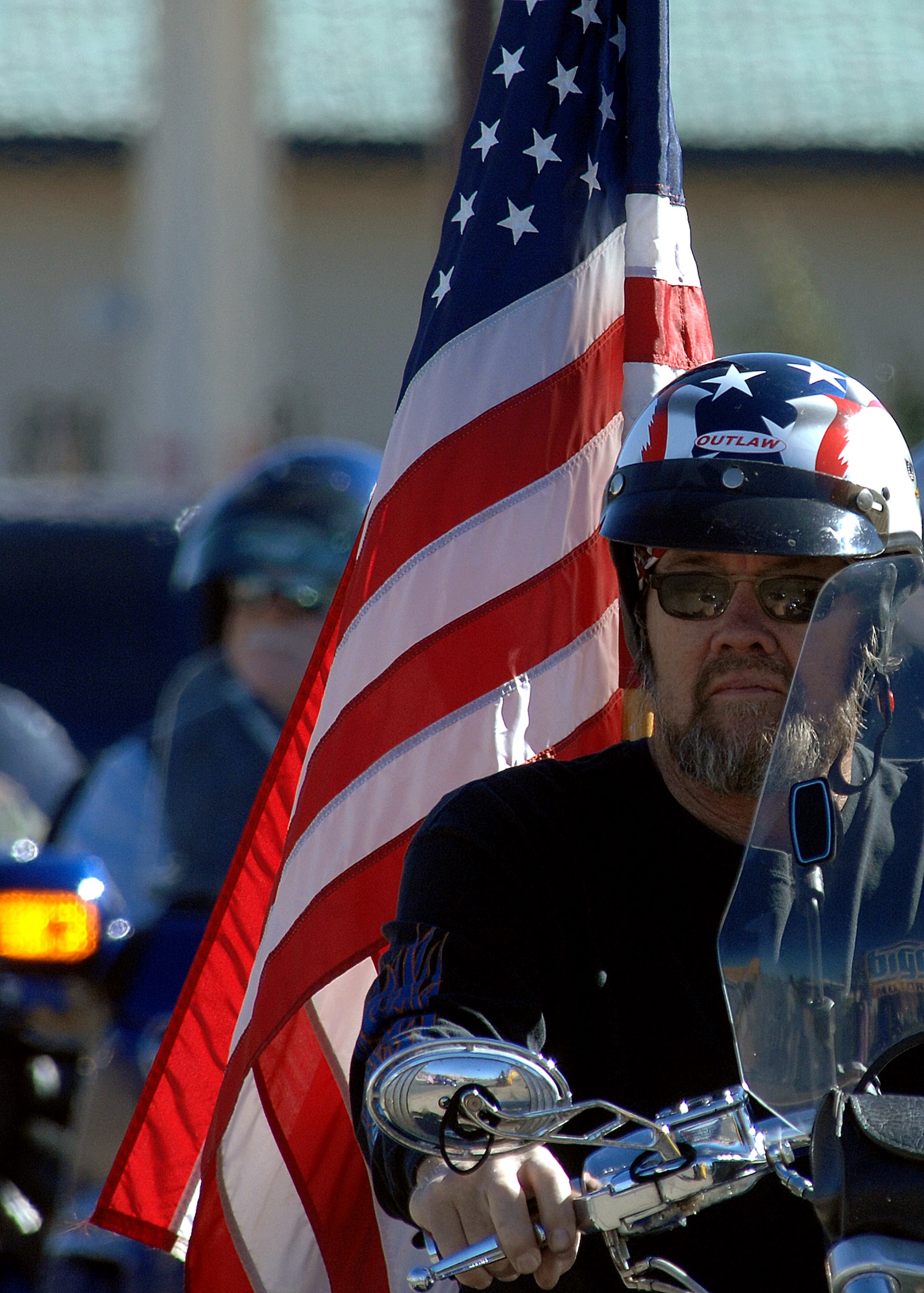 A group of retired and active duty military members ride their motocyles in the Veterans Day parade, Nov. 8, in Alamogordo, N.M. Veterans Day is to honor America's fallen heroes, veterans and members who continue to serve. The Veterans Day National Ceremony is held Nov. 11 each year at Arlington National Cemetery.



(U.S. Air Force photo/ Senior Airman Anthony Nelson)
