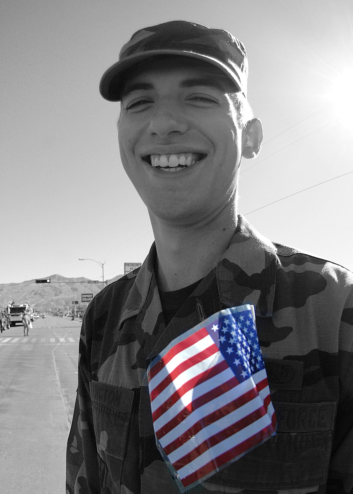 Airman 1st Class Collier Buffington, 49th Logisitics Readiness Squadron, Holloman Air Force Base, N.M., passes out candy to children during the Veterans Day parade Nov. 8, in Alamogordo, N.M. The Veterans Day National Ceremony is held Nov. 11 each year at Arlington National Cemetery.



(U.S. Air Force photo/ Senior Airman Anthony Nelson)
