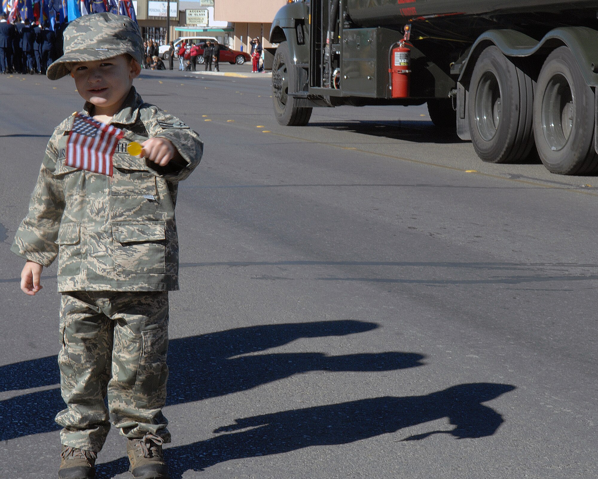 Staff Sgt. David Thomas's son, Antonio, shows his patriotism by waving his American flag during the Veterans Day parade, Nov. 8, in Alamogordo, N.M. The Veterans Day National Ceremony is held Nov. 11 each year at Arlington National Cemetery.



(U.S. Air Force photo/ Senior Airman Anthony Nelson)
