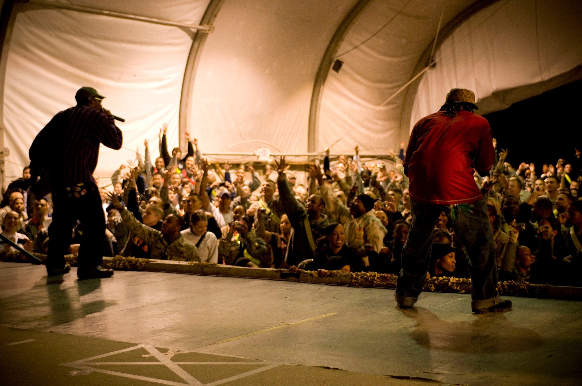 Kaine and D-Roc of rap group "Yin Yang Twins" performs with USO Tour "Around the World in 8 Days" at Bagram Air Field, Afghanistan, Nov. 13. (U.S. Air Force photo by Staff Sgt. Samuel Morse)(Released)