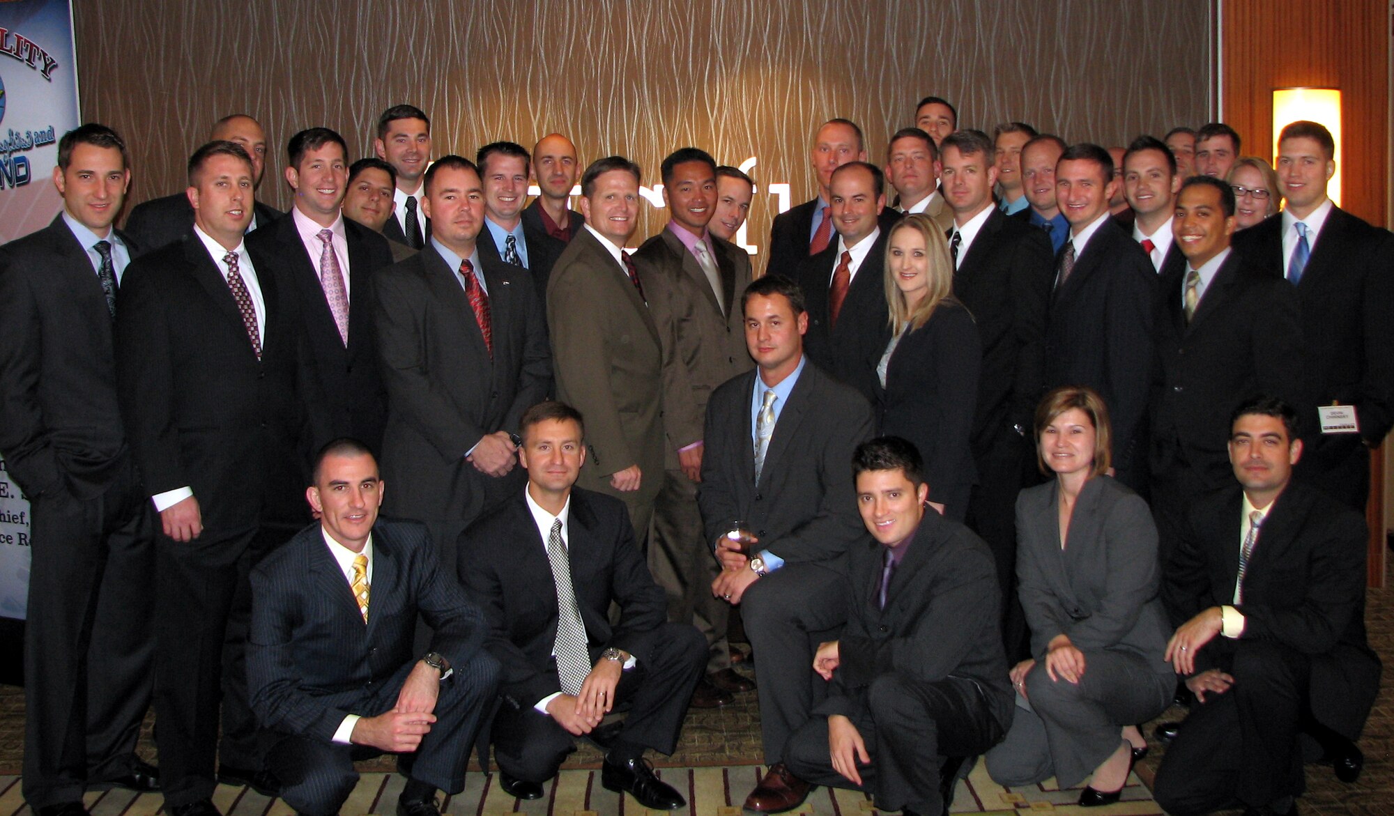 Colonel Jeff Dunn, 14th Flying Training Wing vice commander, poses for a group photo with 40 other BLAZE Team members at the Anaheim Convention Center in southern California where they attended the 40th annual Airlift/Tanker Association National Convention. (U.S. Air Force photo)