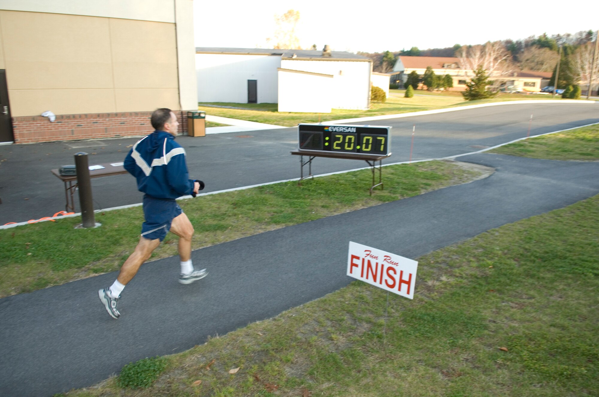 HANSCOM AIR FORCE BASE, Mass. – More than 40 Hanscom personnel took part in the Pilgrim’s Parade 5K Fun Run on Nov. 12. Shown here Col. David Orr, 66th Air Base Wing commander was the first to cross the finish line with a time of 20:03, the winning female time came from Col. May McRae, 350th Electronic Systems Group with a time of 21:15.  (U.S. Air Force photo by Rick Berry)